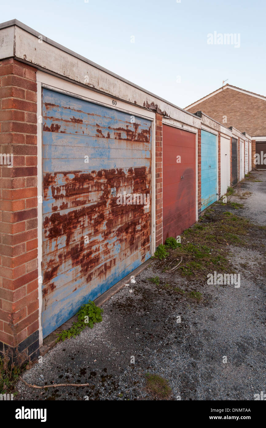 Old lock up garage at the end of a row of garages on a housing estate, Nottinghamshire, England, UK Stock Photo