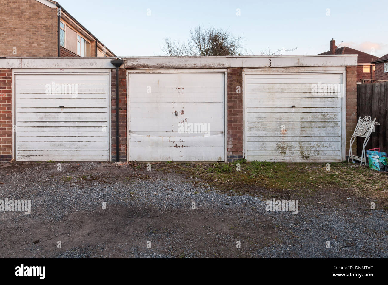 Lock ups. Three lock up garages on a housing estate, Nottinghamshire, England, UK Stock Photo