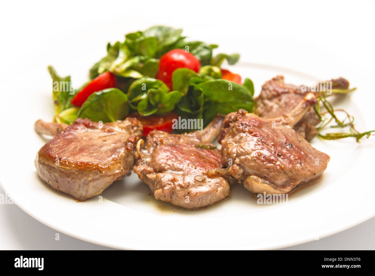 lamb racks with corn salad Stock Photo