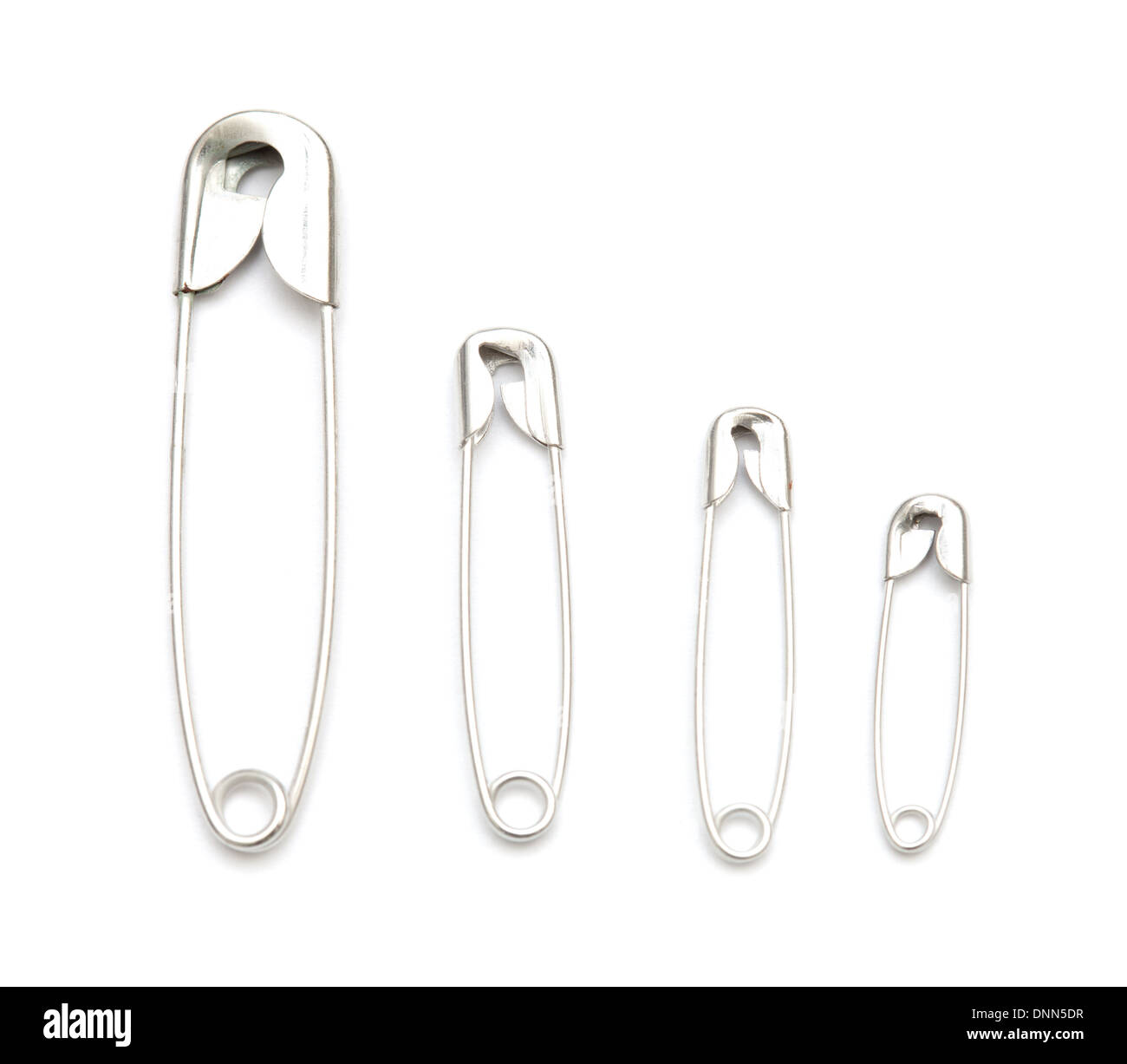 safety pins isolated on white Stock Photo Alamy