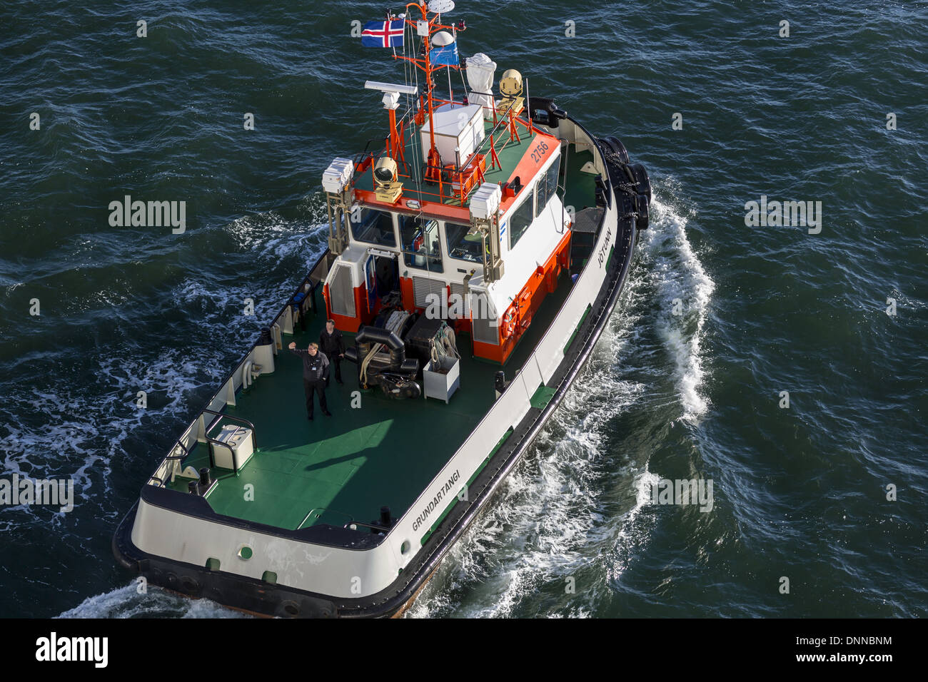Icelandic pilot boat pilot waving Stock Photo Alamy