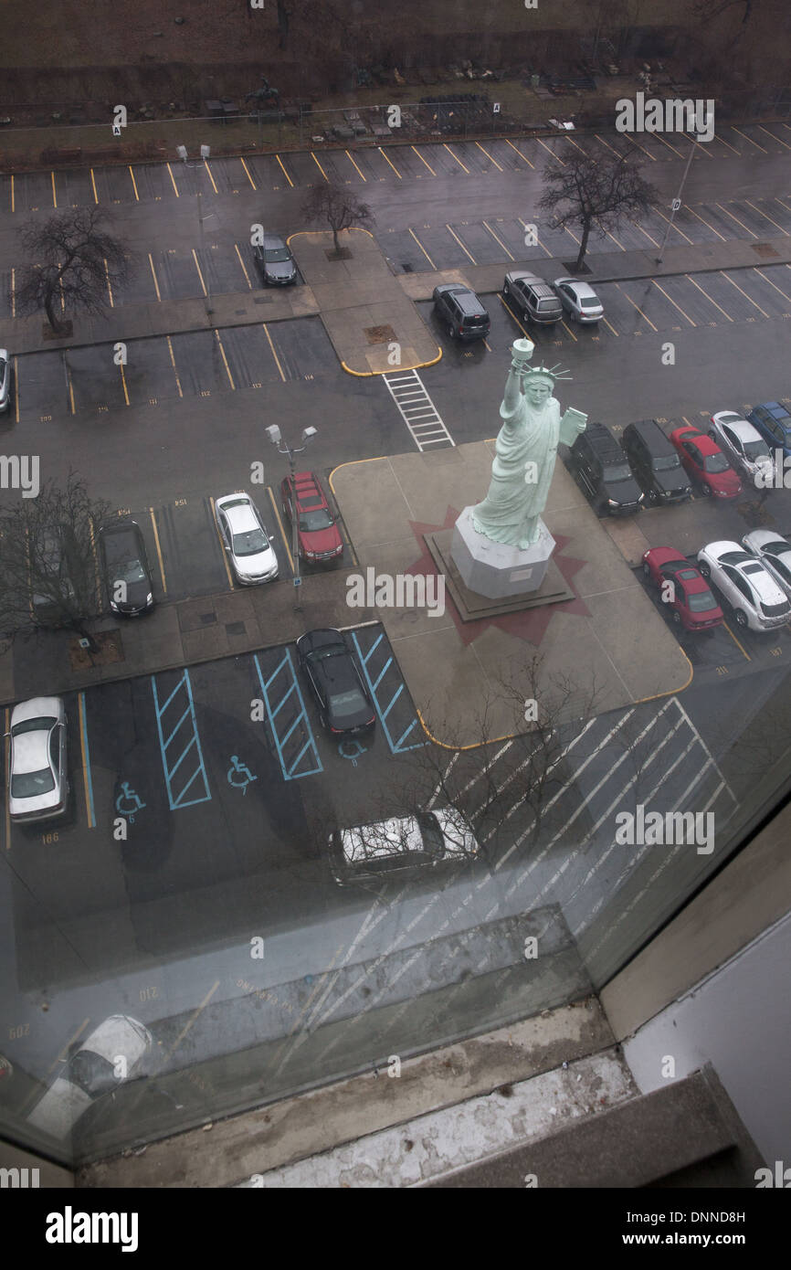 Looking down at the Brooklyn Museum parking lot with a Statue Of
