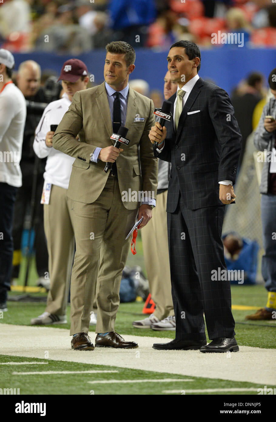 Atlanta, GA, USA. 31st Dec, 2013. December 31, 2013: ESPN cast David Pollack and Jesse Palmer during the Chick-Fil-A Bowl NCAA football game between the Duke Blue Devils and the Texas A&M Aggies at Georgia Dome in Atlanta, Georgia. Duke leads the first half against Texas A&M, 38-17. © csm/Alamy Live News Stock Photo