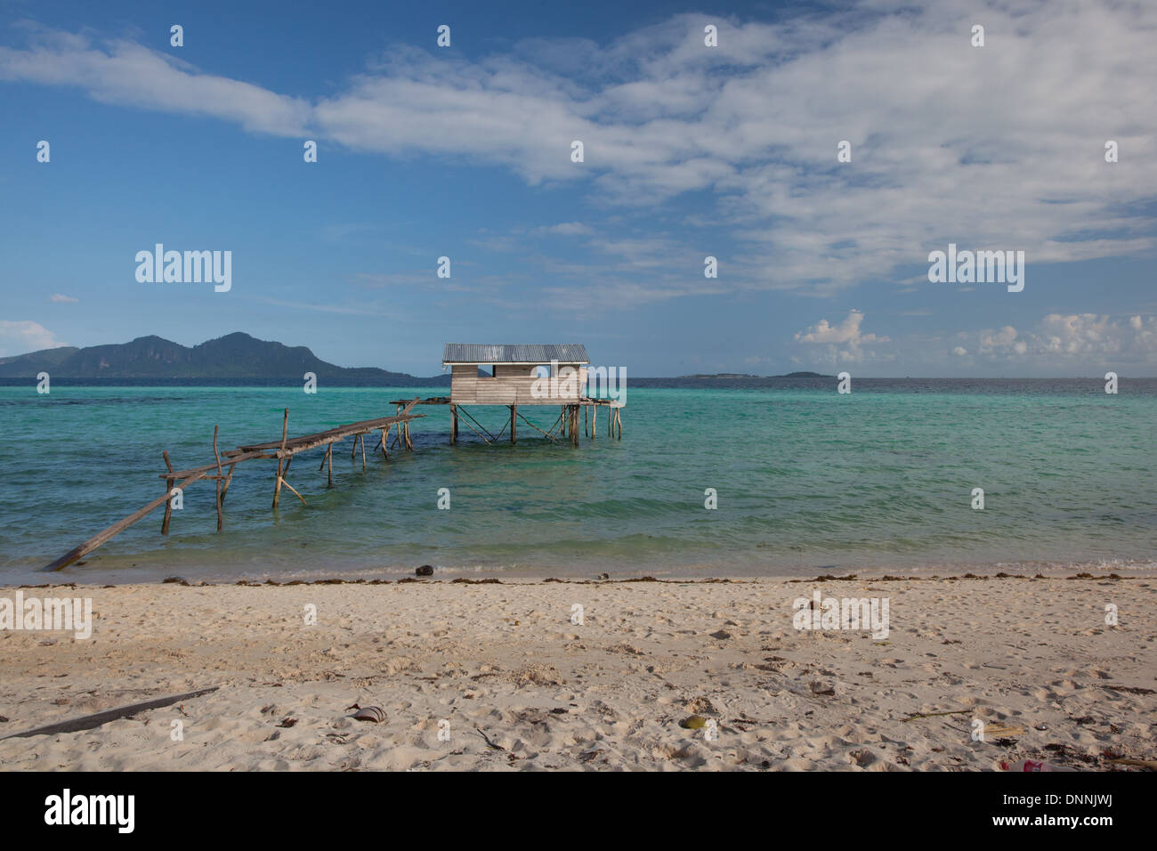 a house with an island background Stock Photo - Alamy
