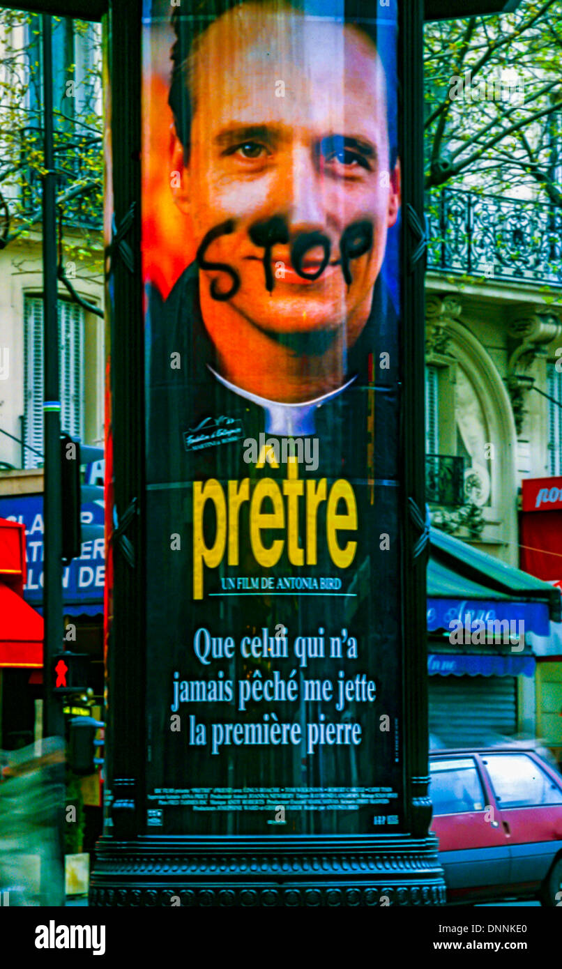 Paris, France, French Advertising Movie Poster on Morris Column with Painted Tag Homophobe Slogan 1995, french film movie sign poster French Stock Photo