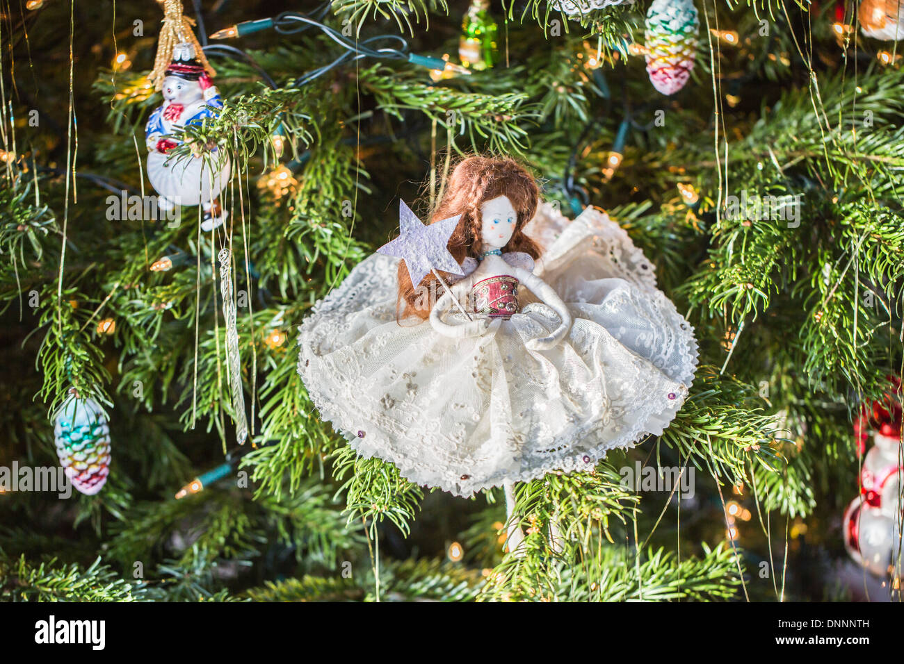 Handmade traditional Christmas tree fairy decoration in white antique
