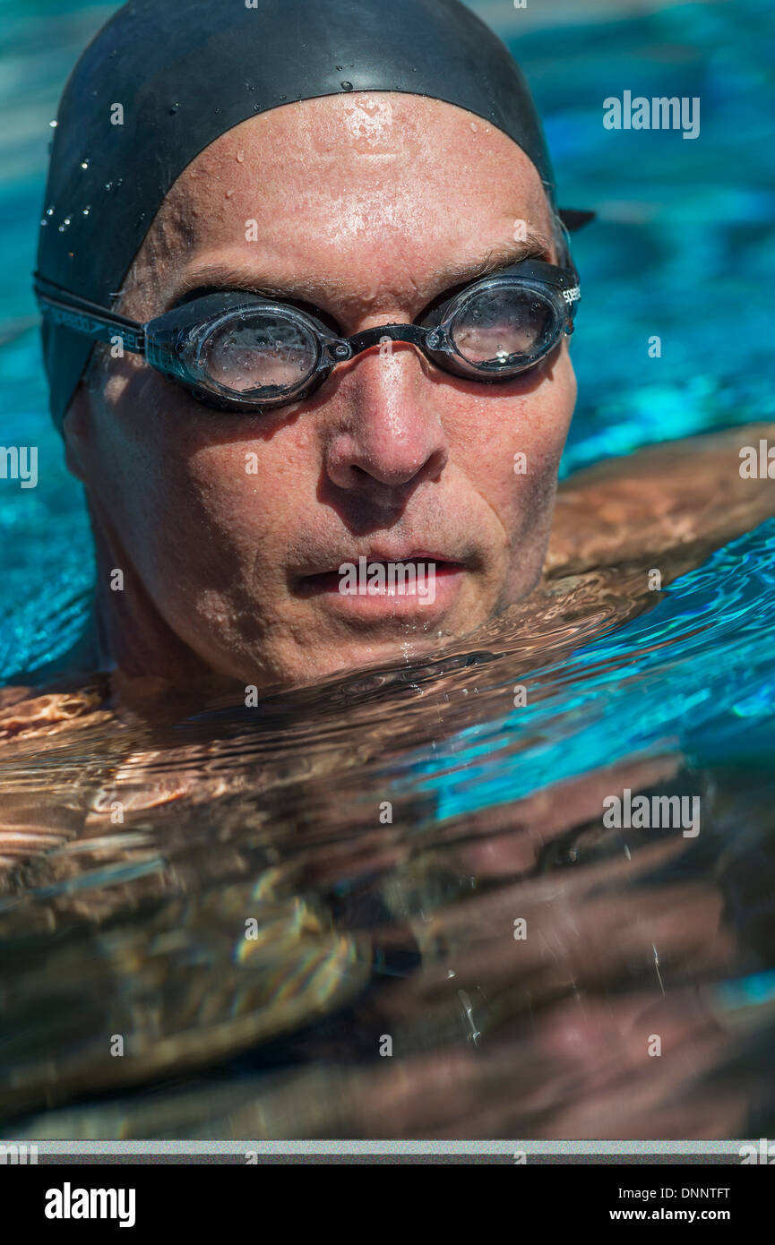 Portrait of swimmer wearing cap and goggles Stock Photo Alamy