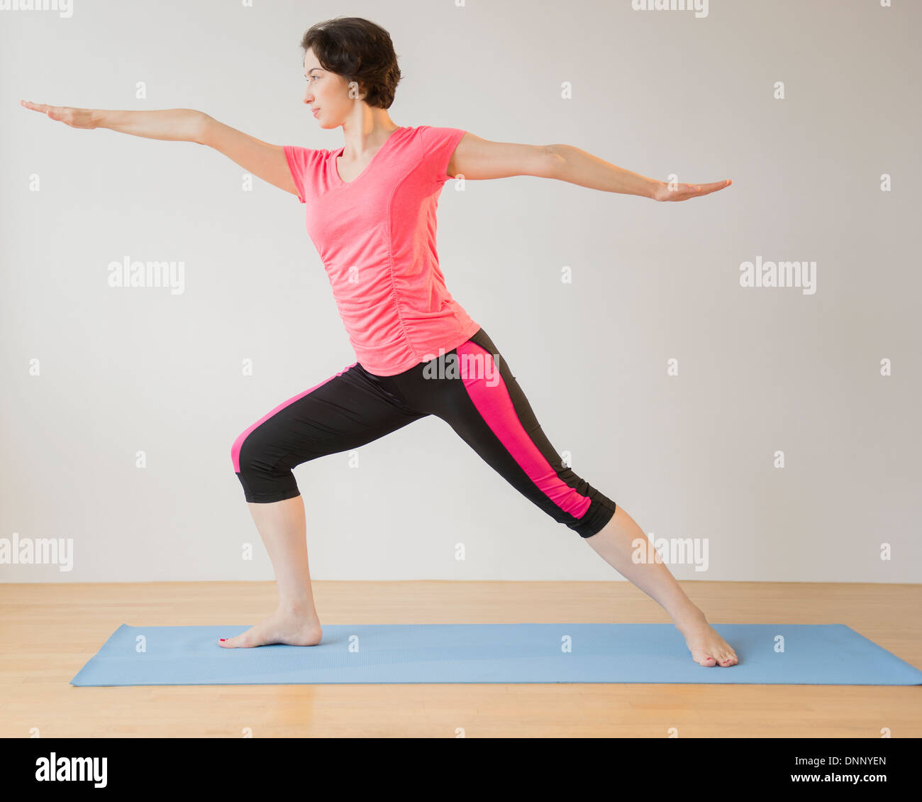 Woman raising arms side view hi-res stock photography and images - Alamy