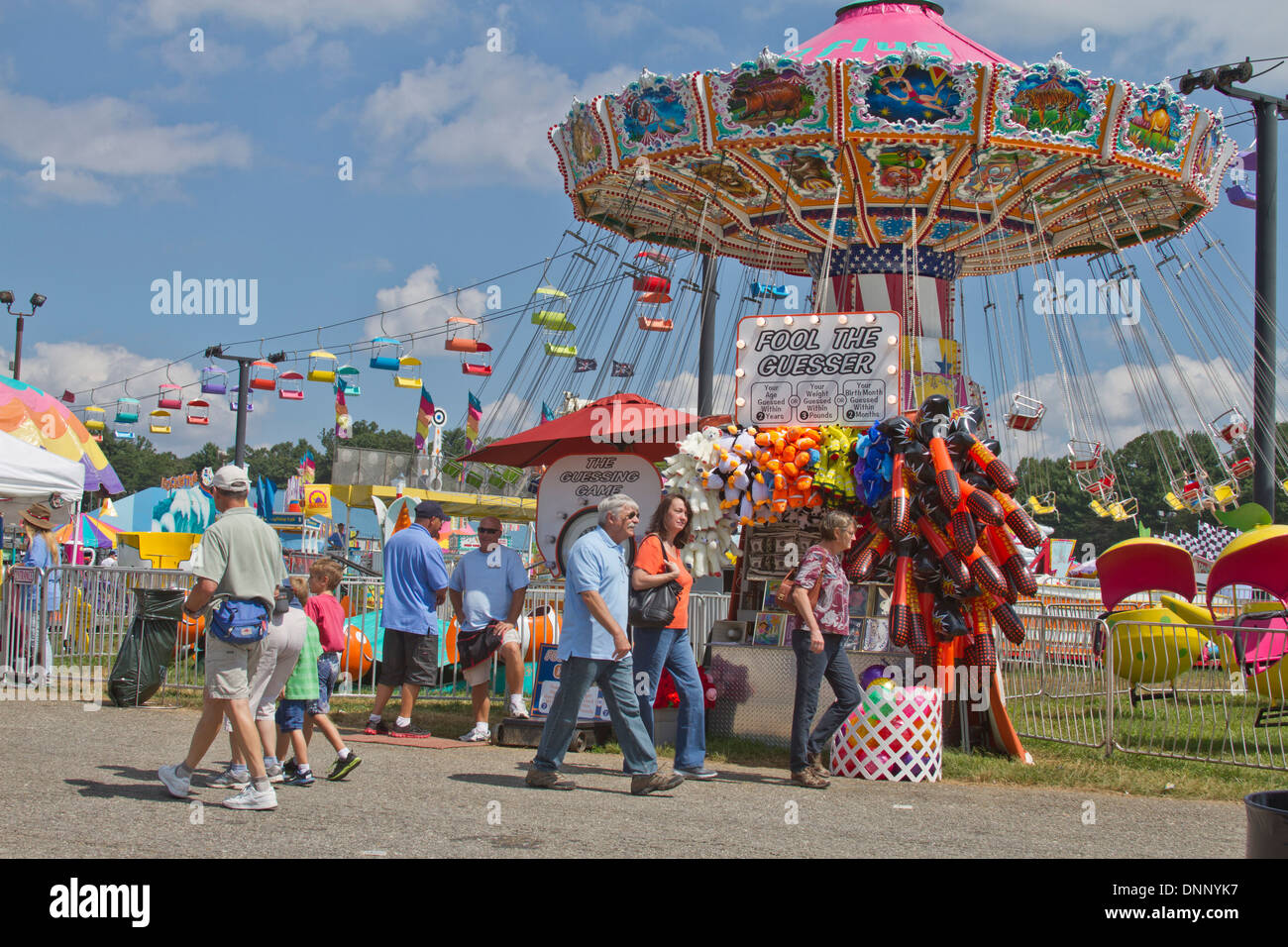Fletcher, North Carolina, USA September 13, 2013 People enjoying the colorful rides and games