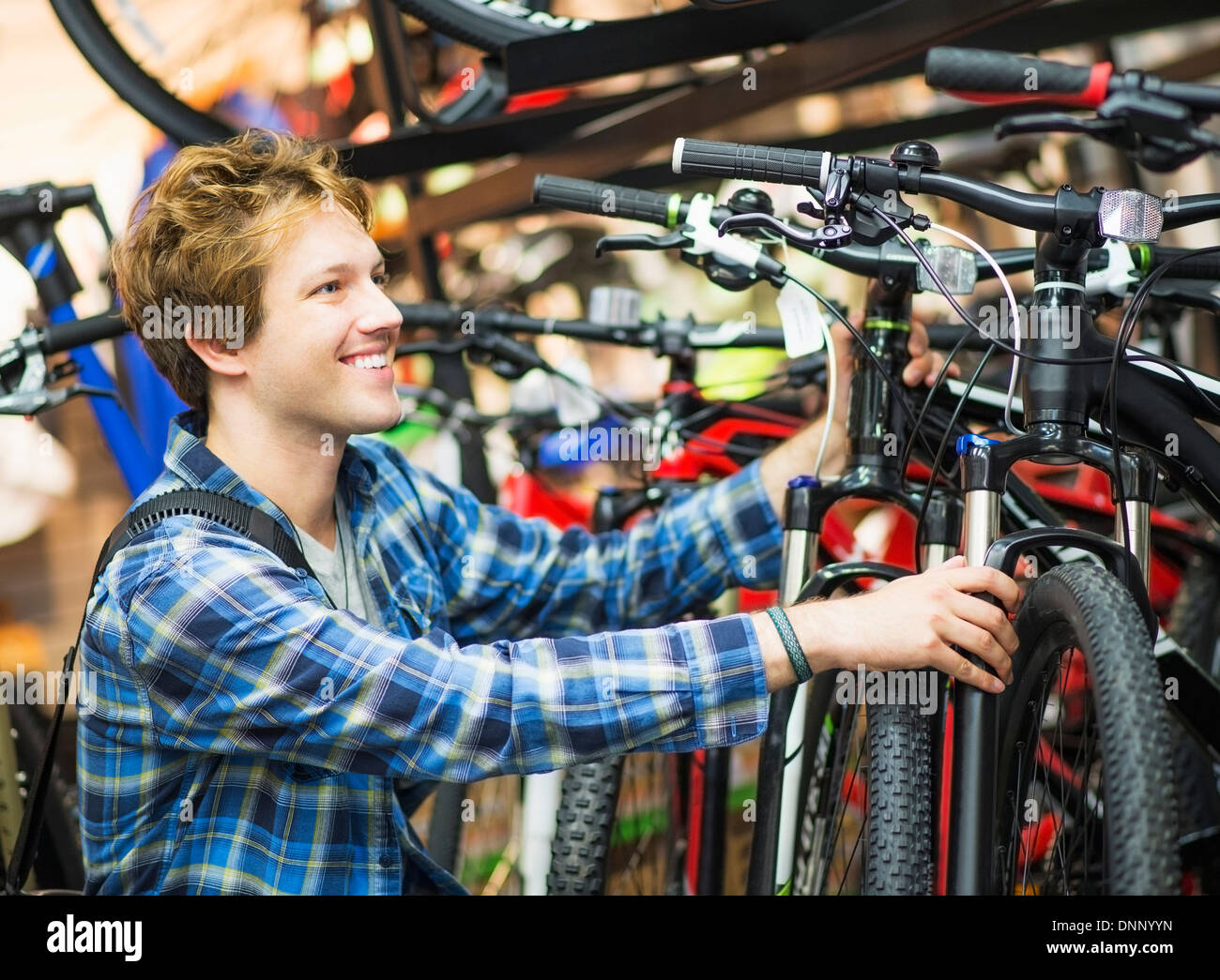 Man choosing bike hi-res stock photography and images - Alamy