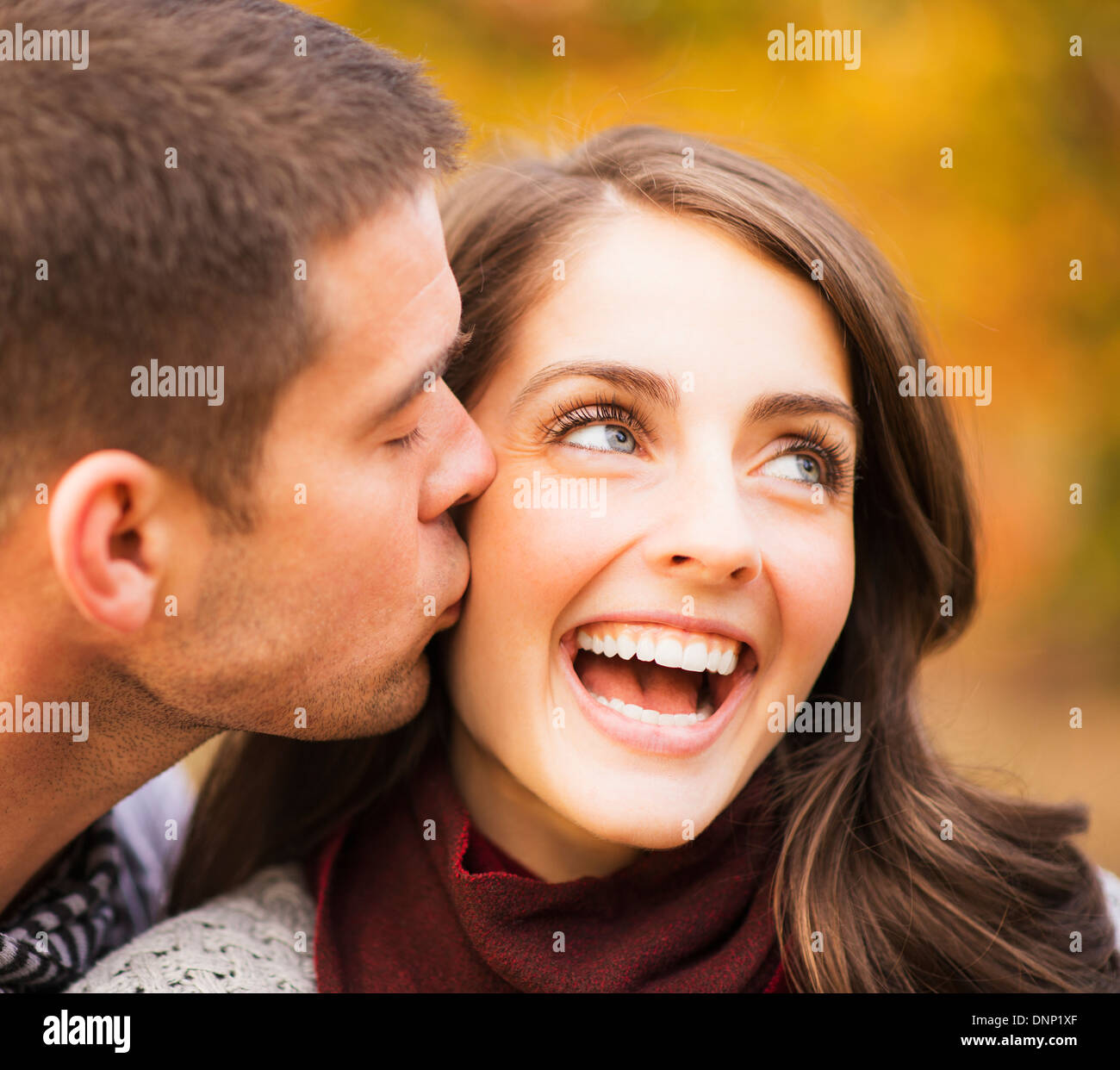 Man kissing woman on head hi-res stock photography and images - Alamy