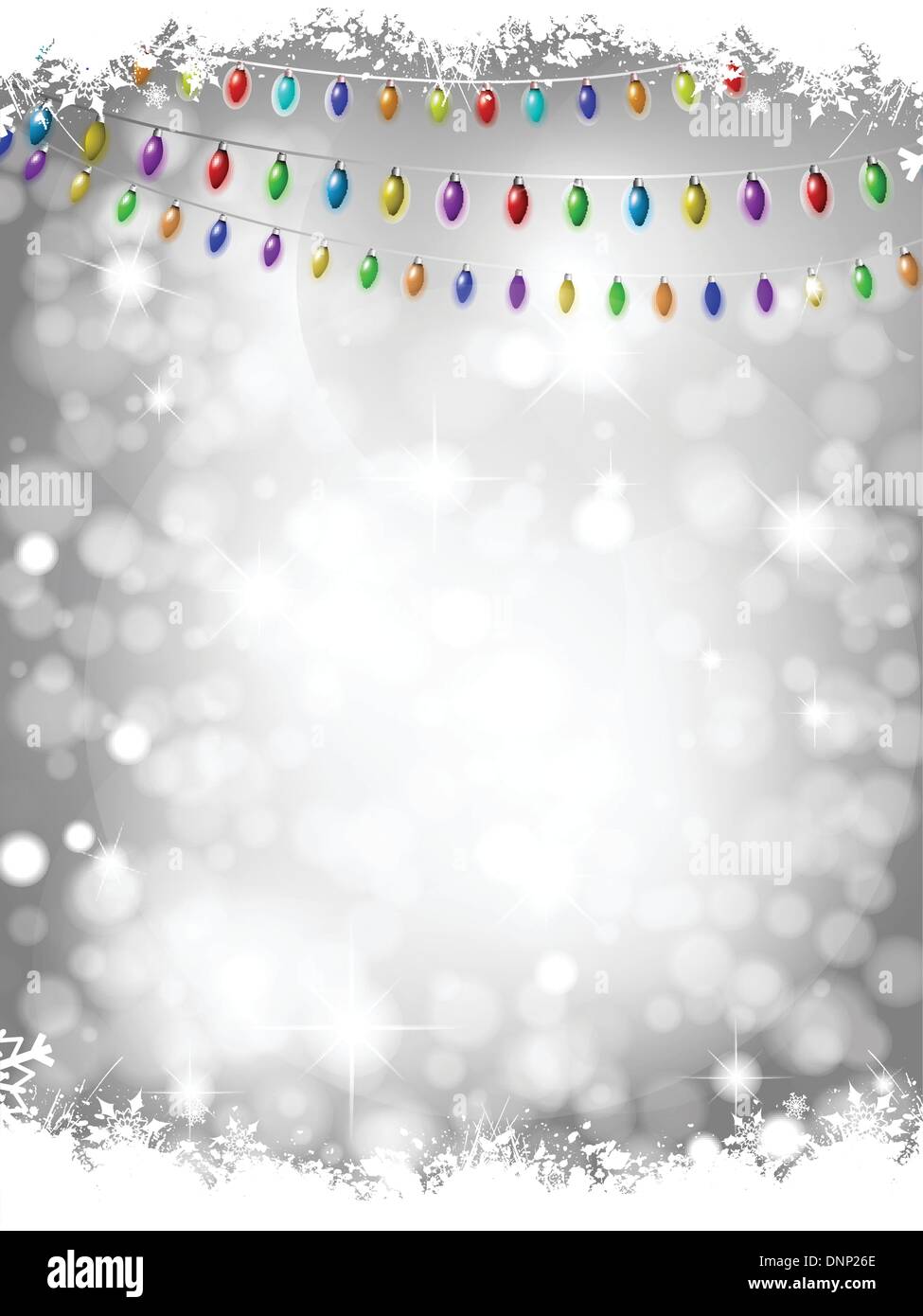 Christmas lights on a silver bokeh lights background with snow Stock ...