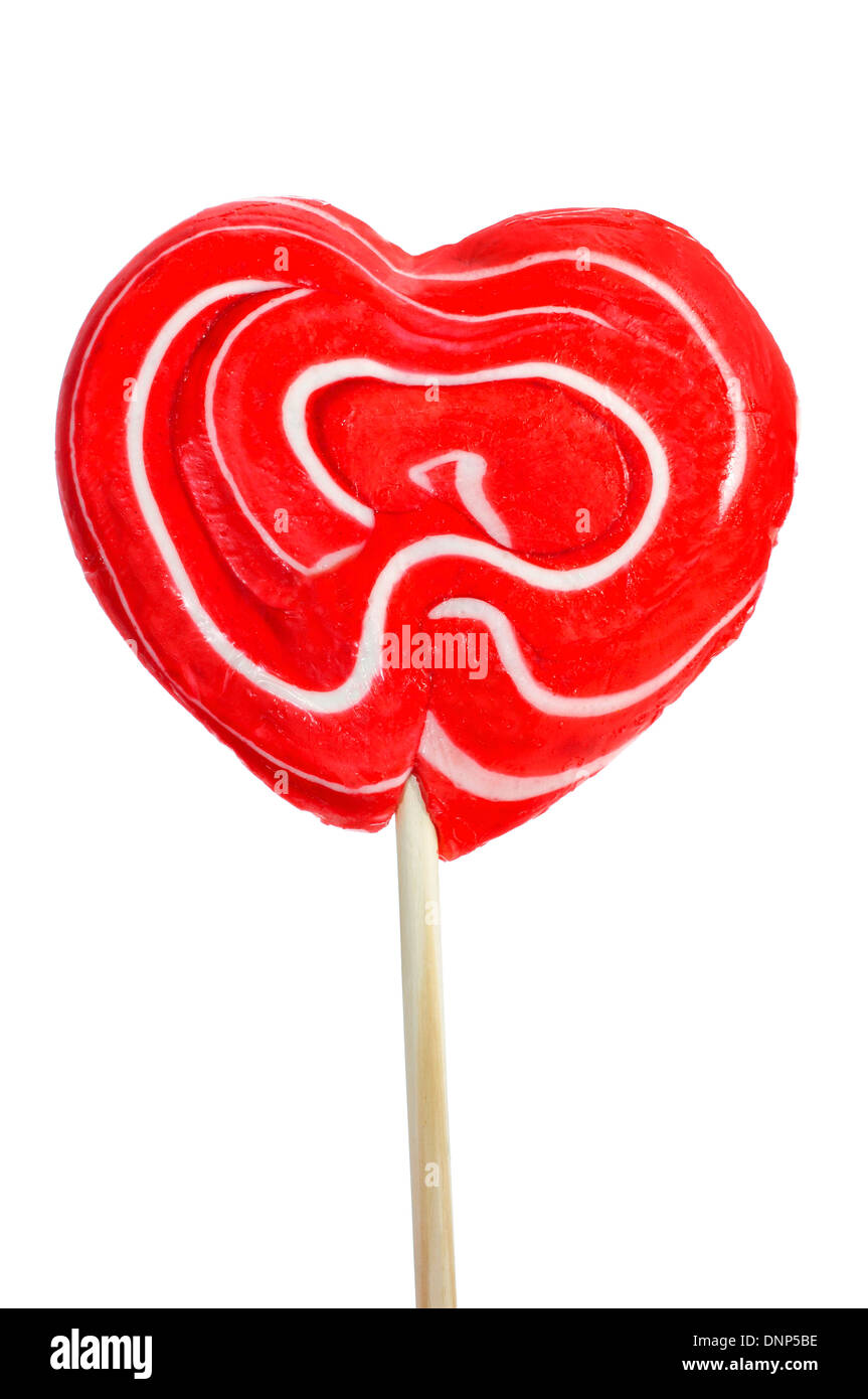 a heart-shaped lollipop on a white background Stock Photo
