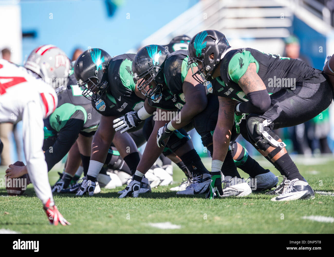 Dallas, Texas, USAJanuary 1st, 2014: .North Texas offensive line during the 2014 Heart of Dallas Bowl football game between the University Las Vegas Nevada Rebels and the North Texas Mean Green Eagles at Cotton Bowl Stadium in Dallas, Texas. Credit:  Cal Sport Media/Alamy Live News Stock Photo