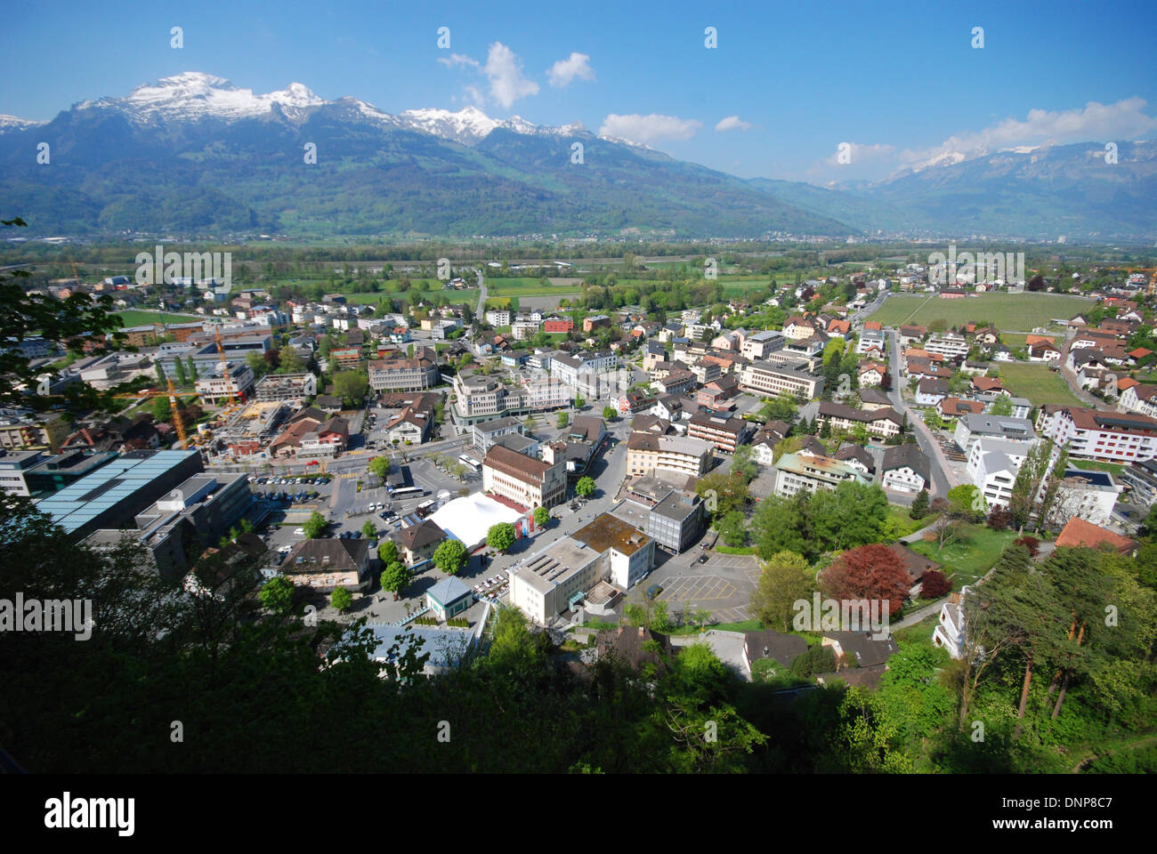 View over Vaduz, Liechtenstein, with Swiss mountains in the distance Stock Photo
