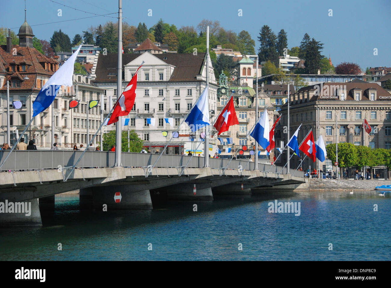 Flag covered bridge over the River Reuss in Lucerne, Switzerland Stock Photo