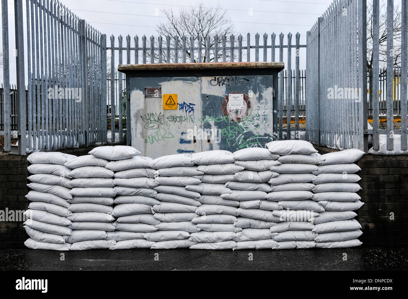 Sandbags protect a water pumping station as preparations are put in place for expected widespread flooding Stock Photo