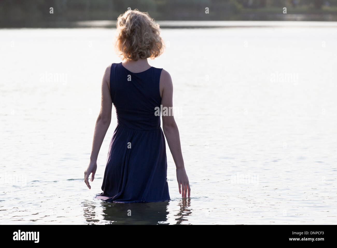 Rear view woman hi-res stock photography and images - Alamy