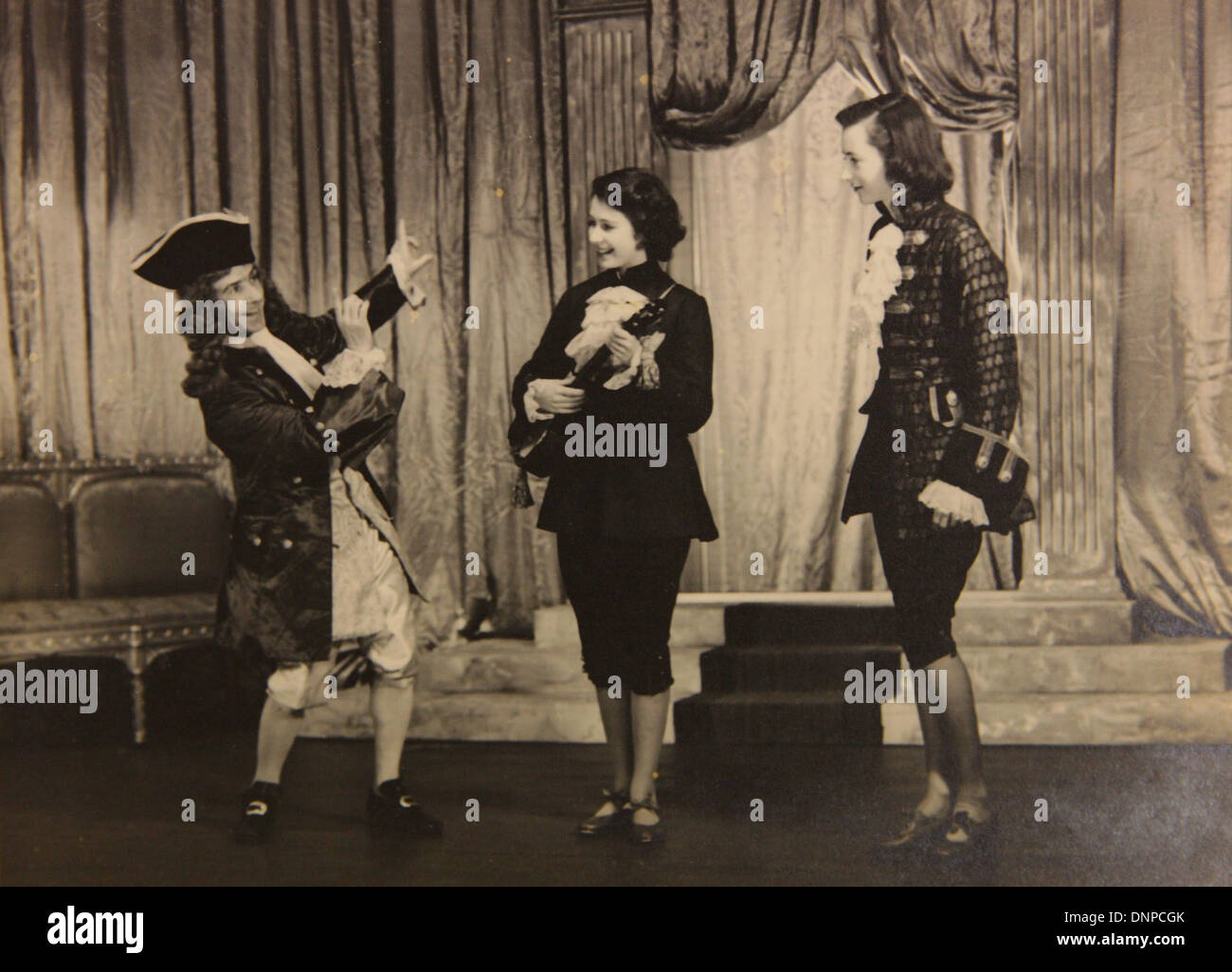 A photograph of Princess Elizabeth (centre) in the play Aladdin, 1943 Stock Photo