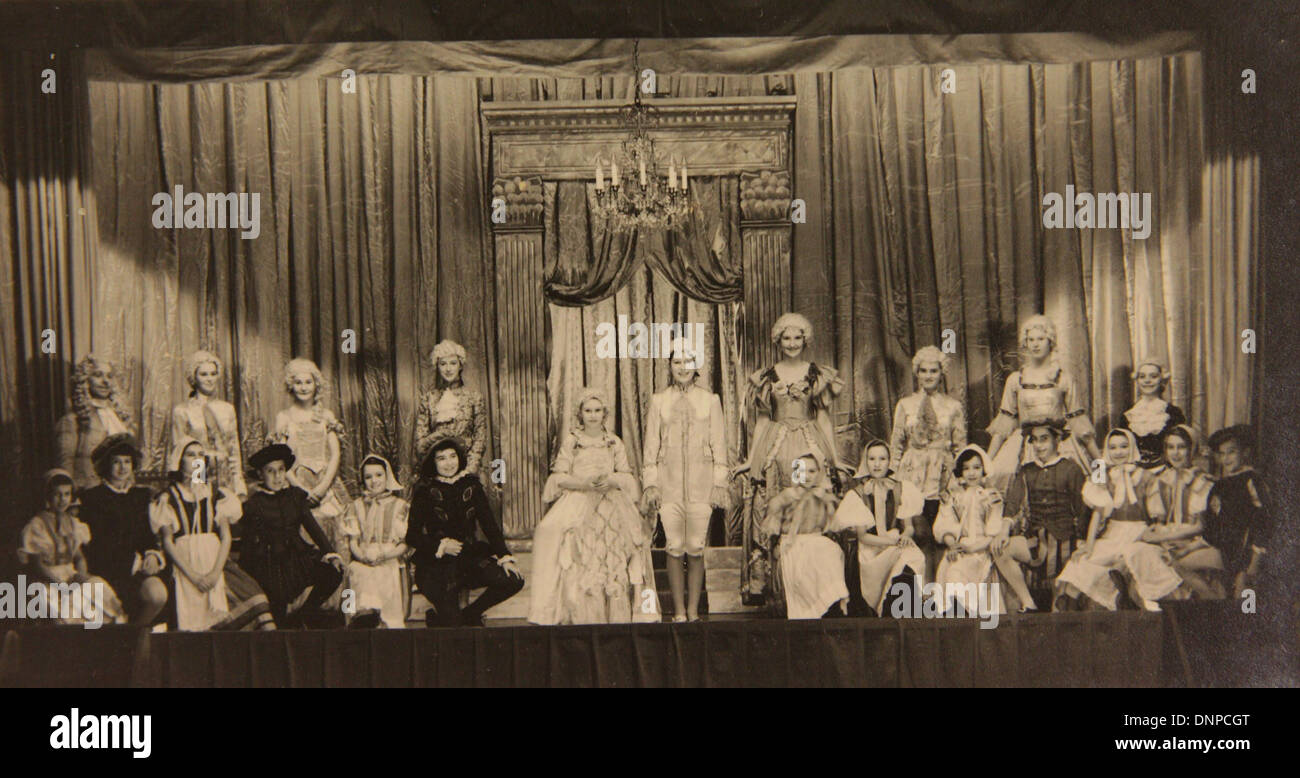 A photograph of Princess Margaret (centre left) and Princess Elizabeth (centre right) in the play Aladdin, 1943 Stock Photo
