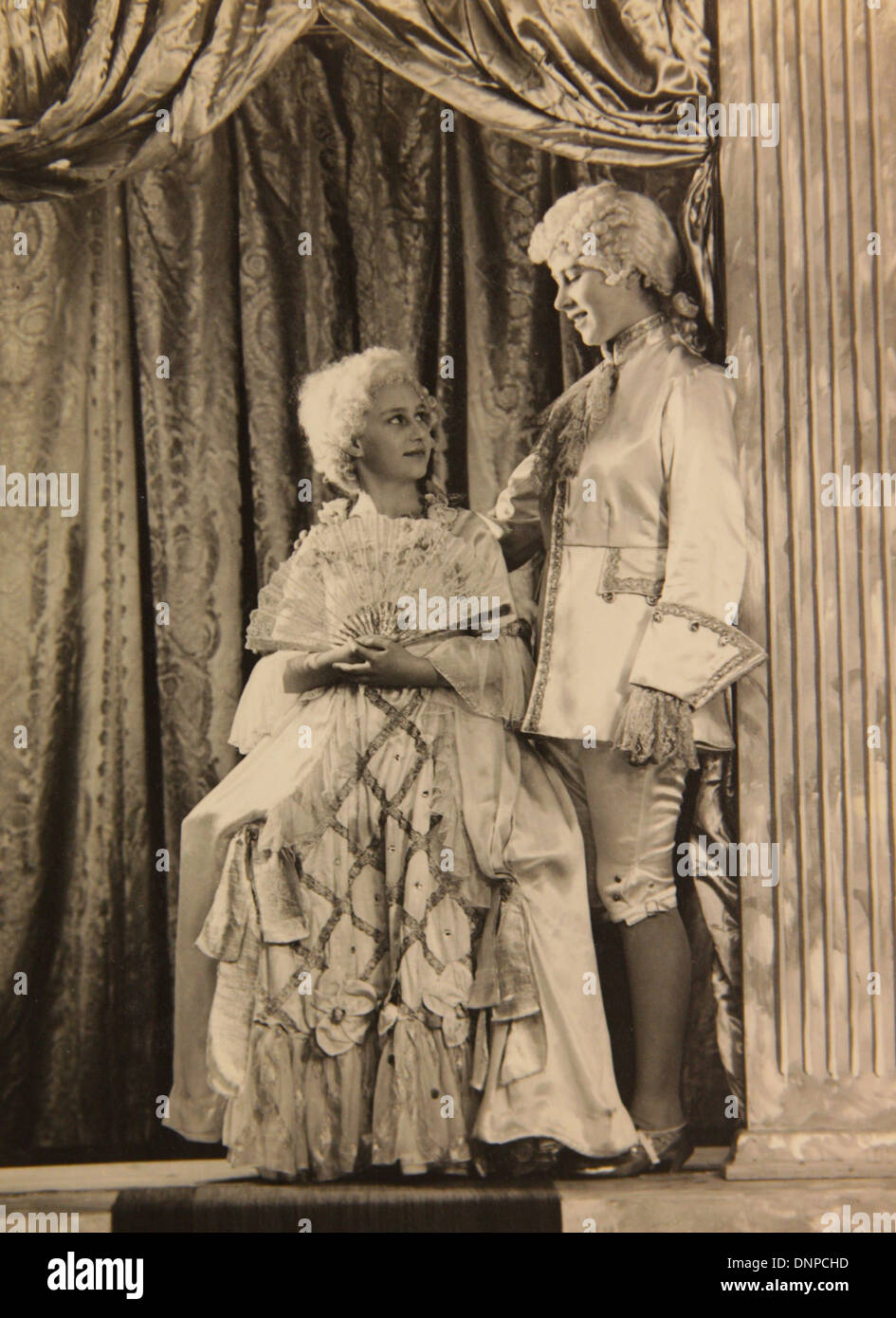 A photograph of Princess Margaret (left) and Princess Elizabeth (right) in the play Aladdin, 1943 Stock Photo