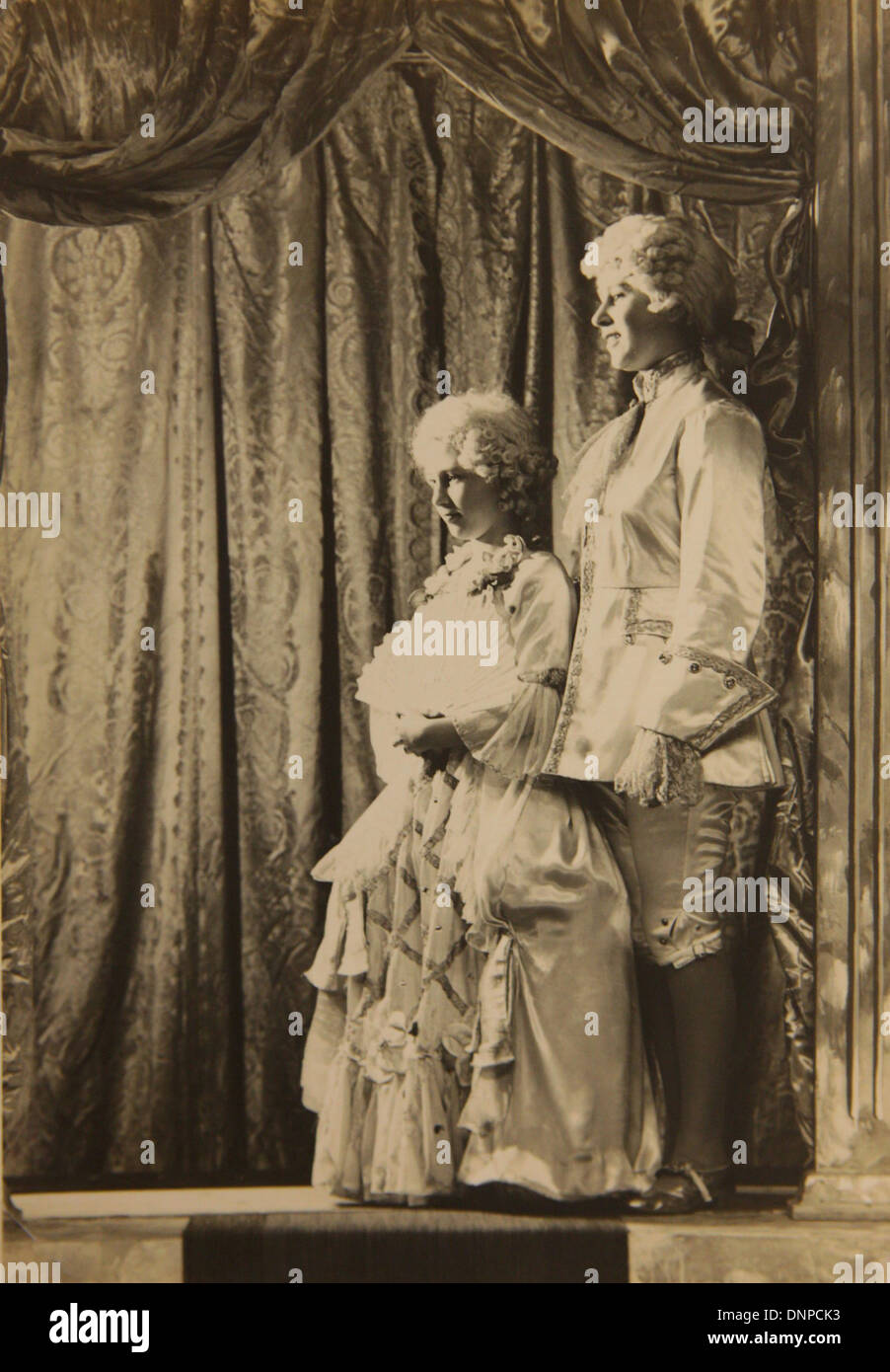 Collect photograph of Princess Margaret (left) and Princess Elizabeth (right) in the play Cinderella, 1941 Stock Photo