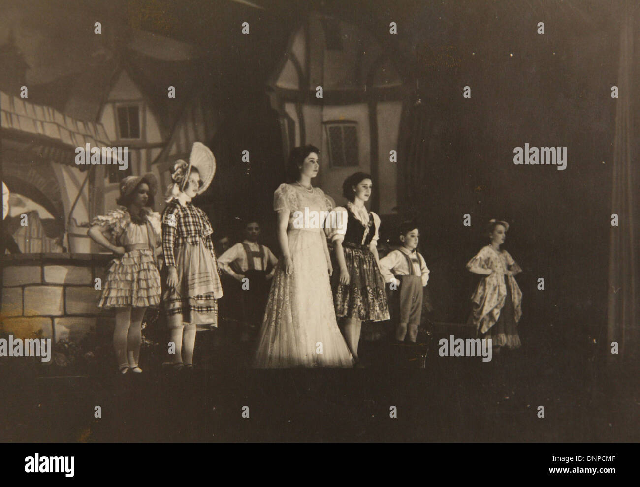 Collect photograph of Princess Elizabeth (middle) and Princess Margaret (right) in the play Old Mother Red Riding Boots, 1944, Stock Photo