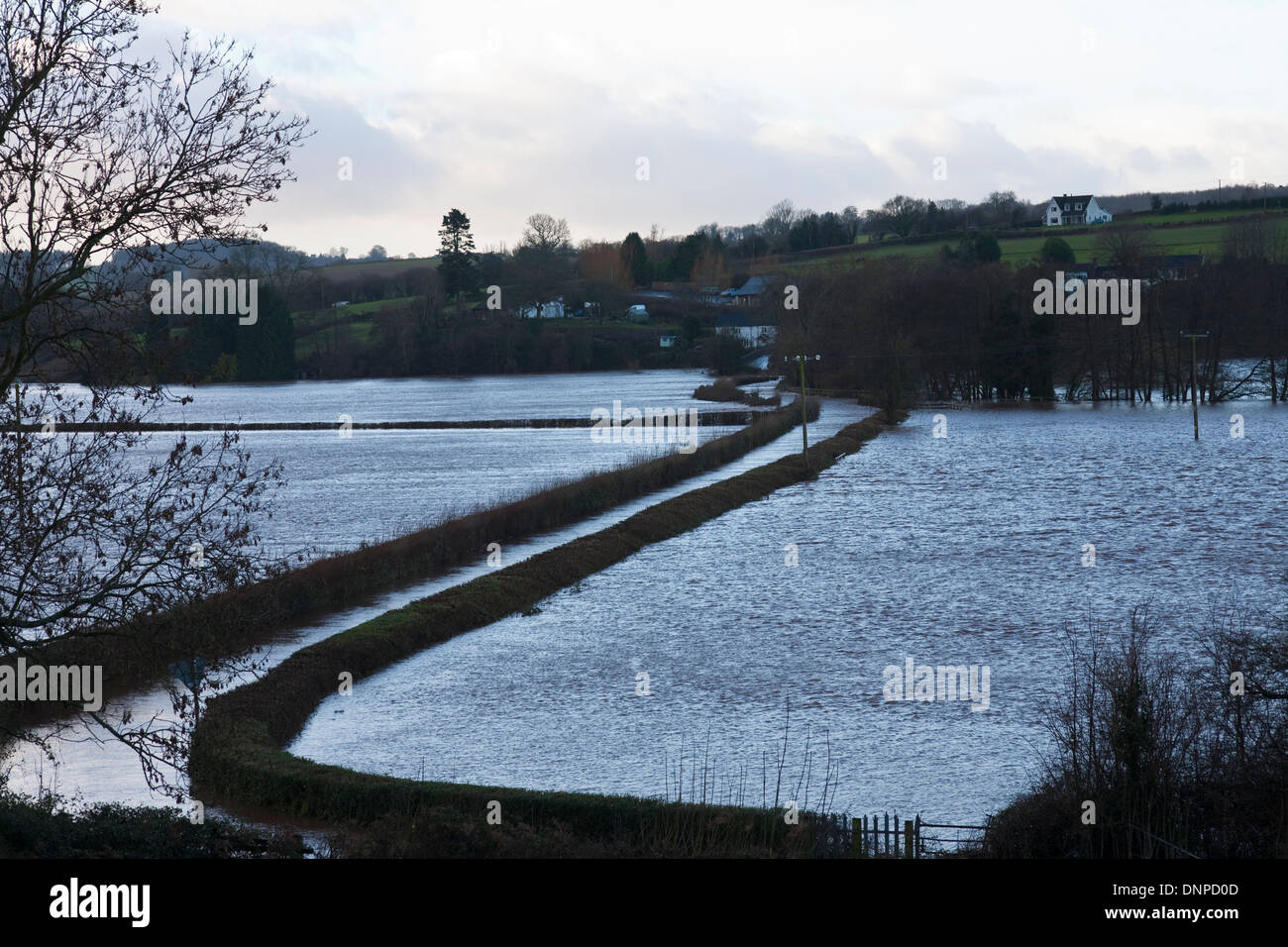 winter rains flooded roads and fields in mid wales Stock Photo