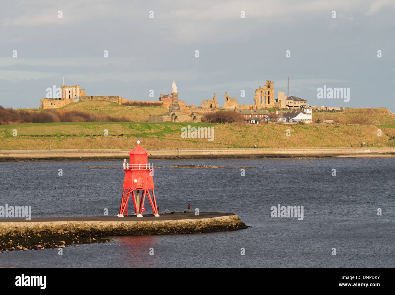 Tynemouth priory and the Herd Groyne pier and lighthouse South Shields