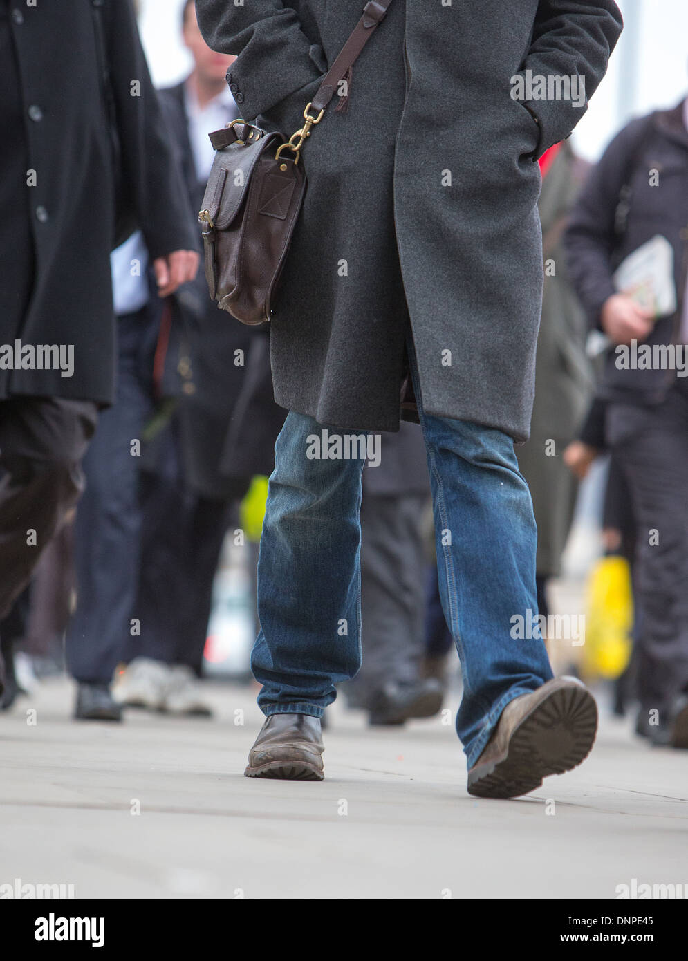 Feet walking to work on London Bridge-Daily drudgery monotony Stock Photo