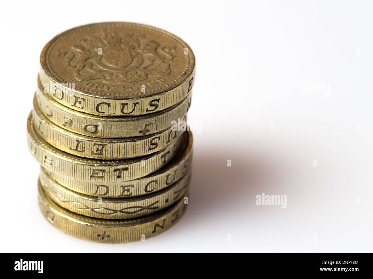 Pile of British one pound coins Stock Photo