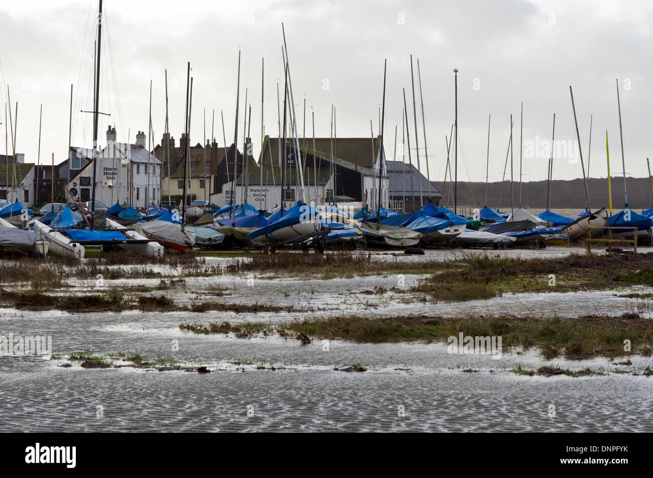 Christchurch, UK. 03rd Jan, 2014. Mudeford Quay houses and pub battered