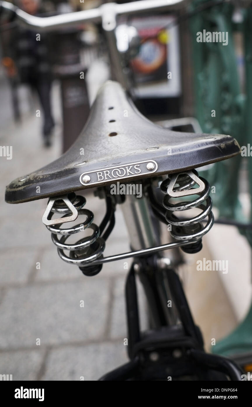 Paris, France - bicycle parked on a city street. Classic Brooks leather bike saddle. Stock Photo