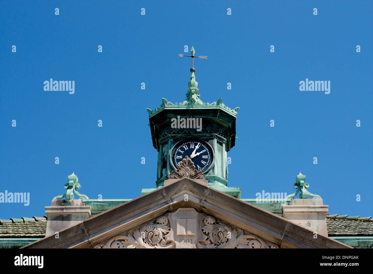 Pennsylvania clock on top of building green clock hires stock