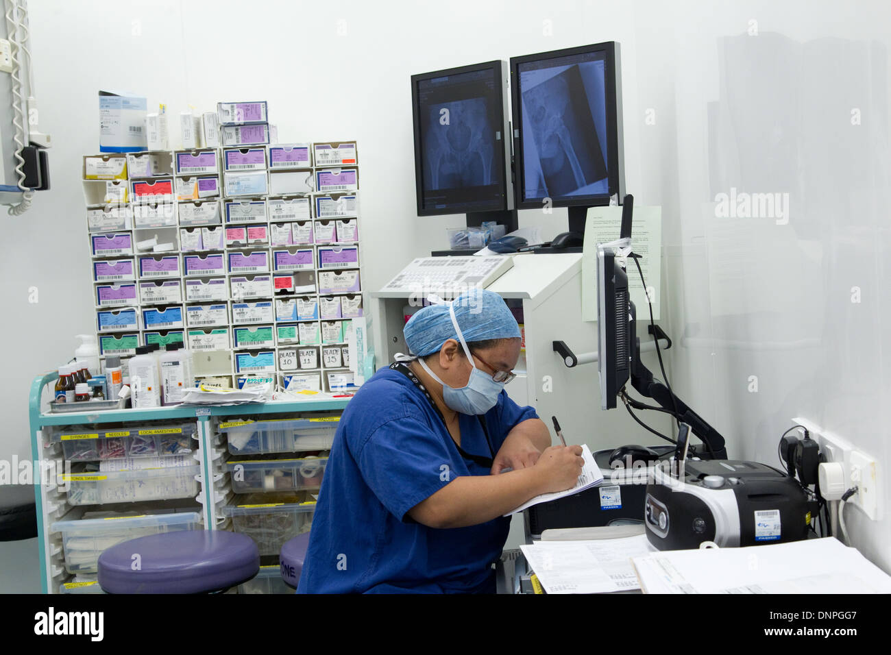Knee operation -Hospital theatre-staff at work-Instruments for operation-Hospital equipment Stock Photo