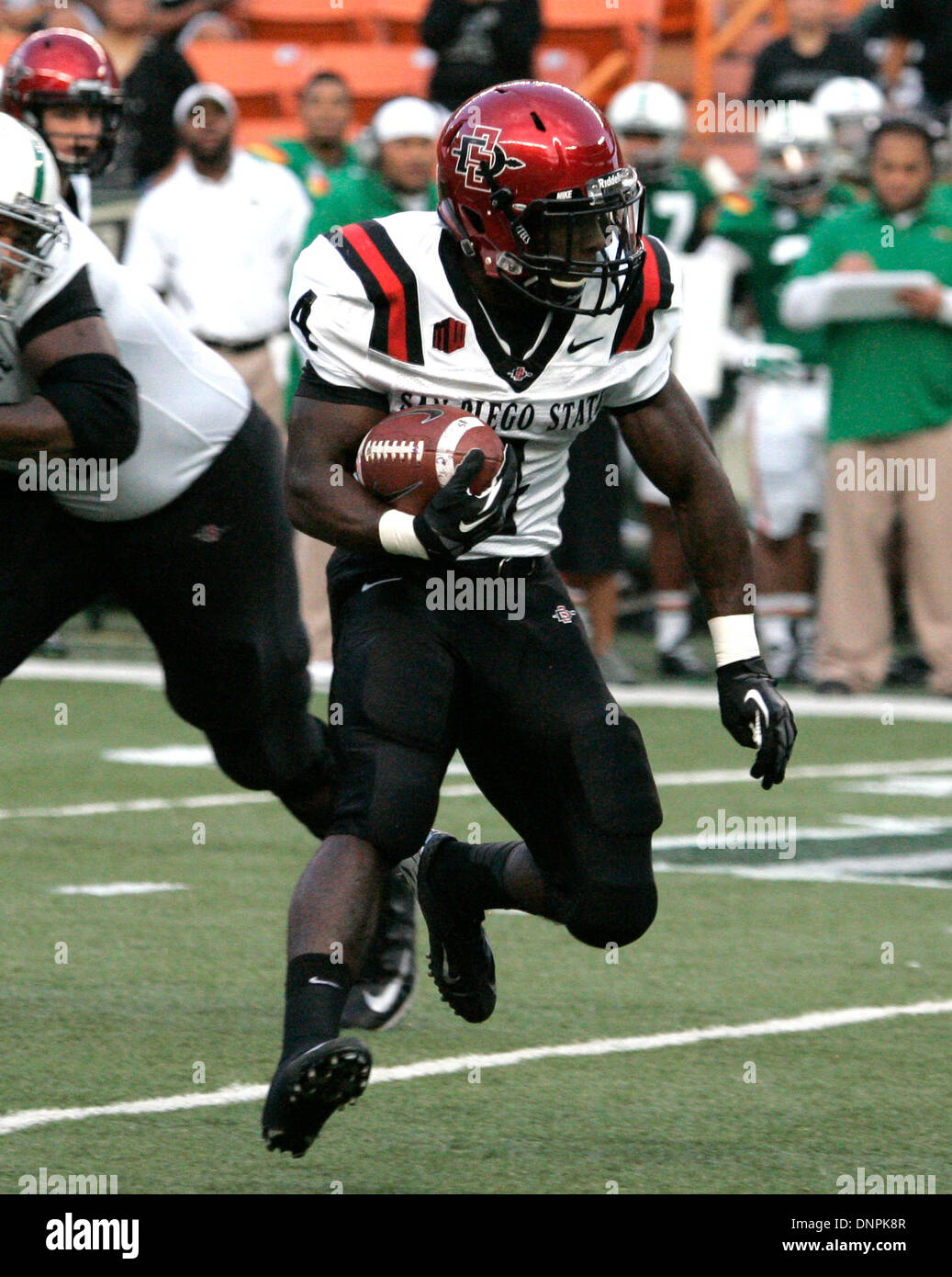 Nov. 2, 2013 - San Diego, CA, United States of America - San Diego State  Aztecs offensive linesman Daniel Brunskill (89) assists San Diego State  Aztecs running back Adam Muema (4) in