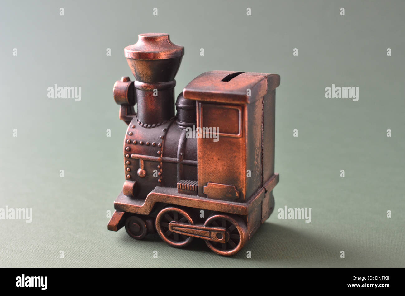 copper steam train money box Stock Photo
