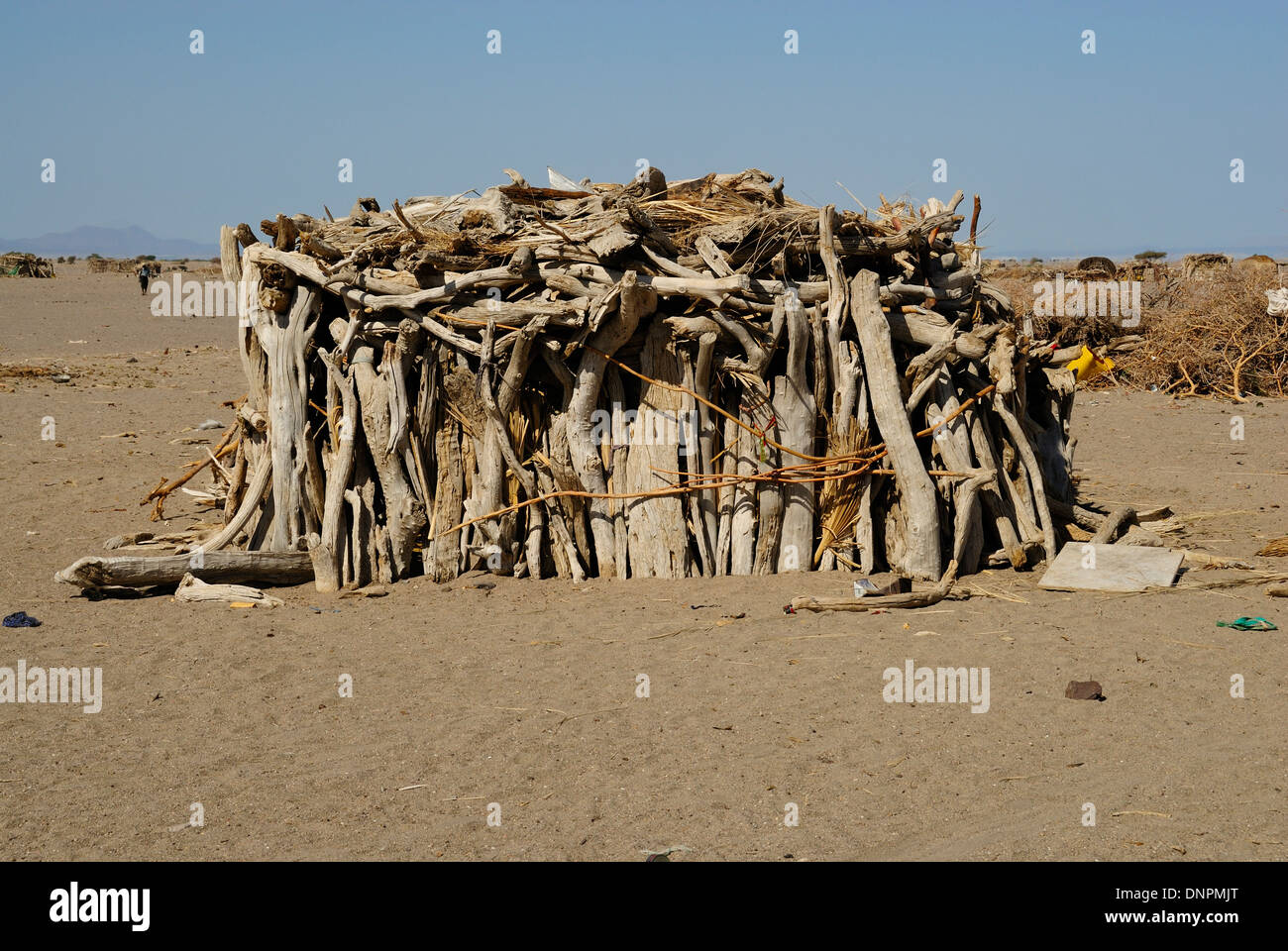 Afar hut made of sticks of wood in the south desert of Djibouti ...