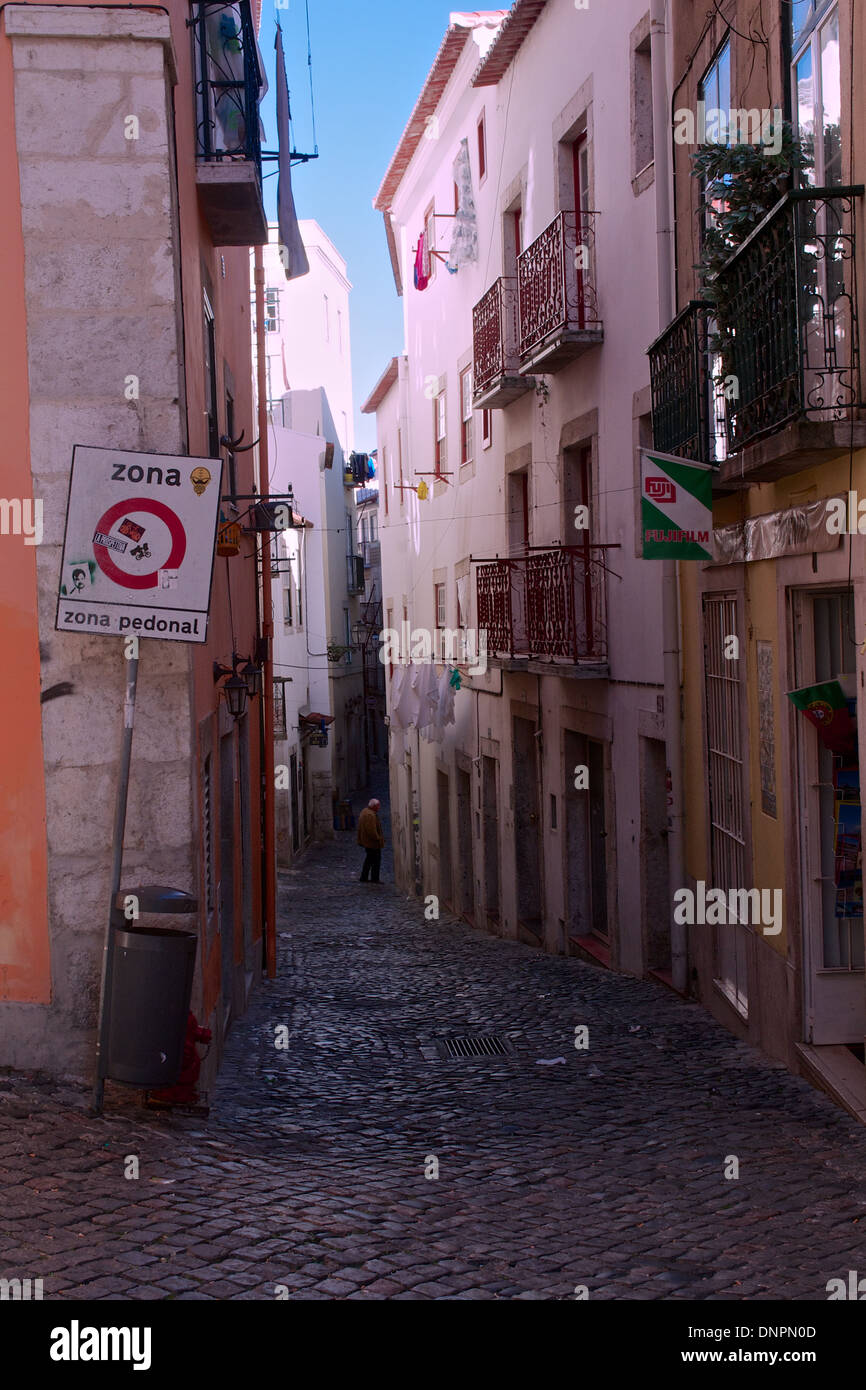 Narrow streets of lisbon’s alfama hires stock photography and images