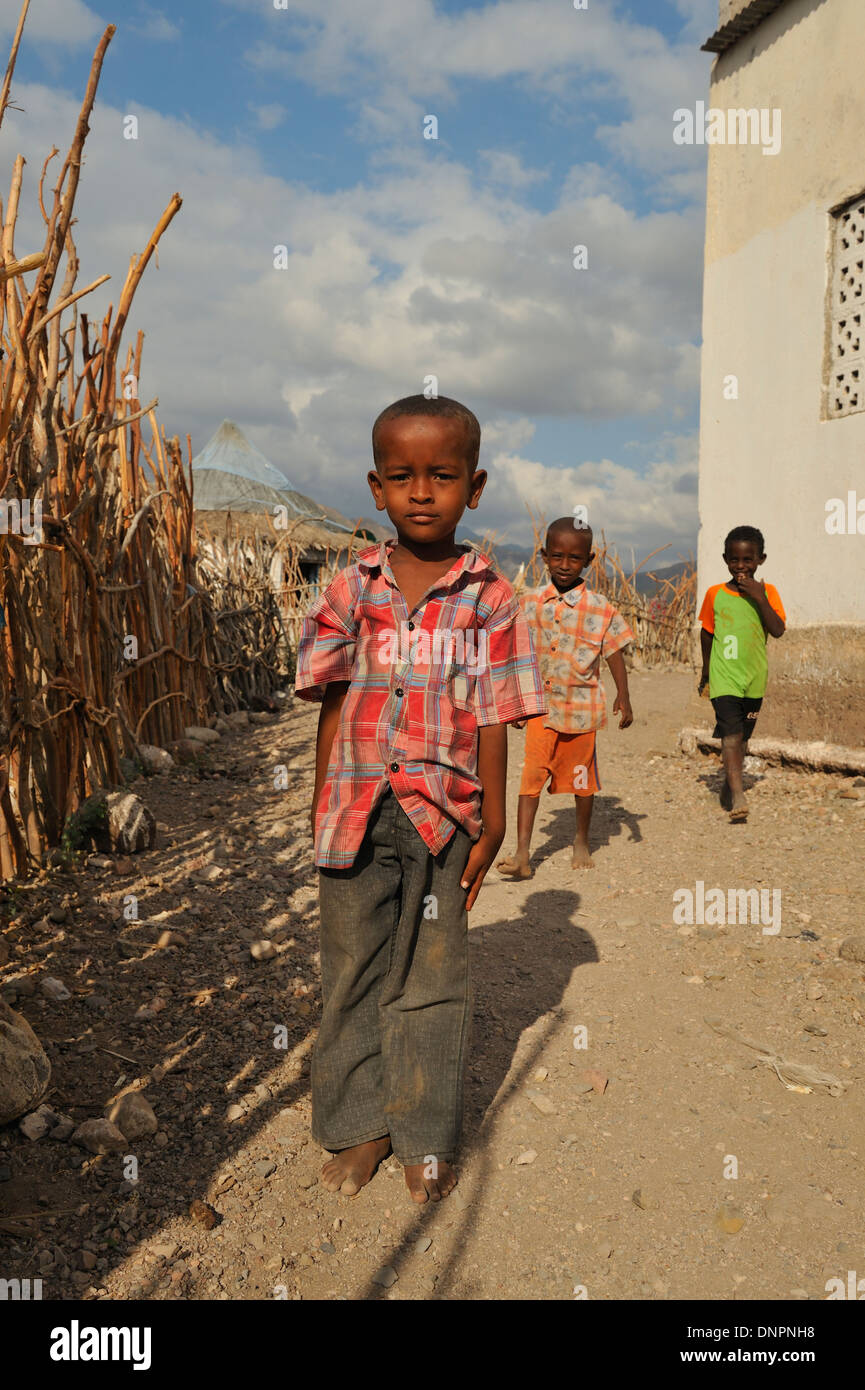 Three Djiboutian boys in a village in northern Djibouti, Horn of Africa Stock Photo
