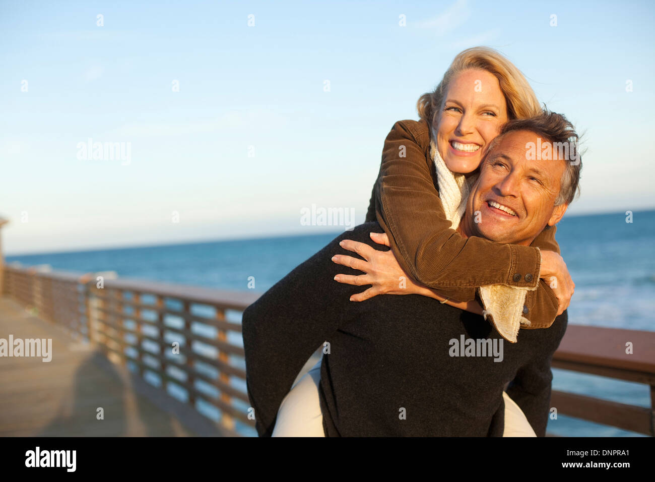 Mature Couple having Fun Walking along Pier, Jupiter, Palm Beach County, Florida, USA Stock Photo