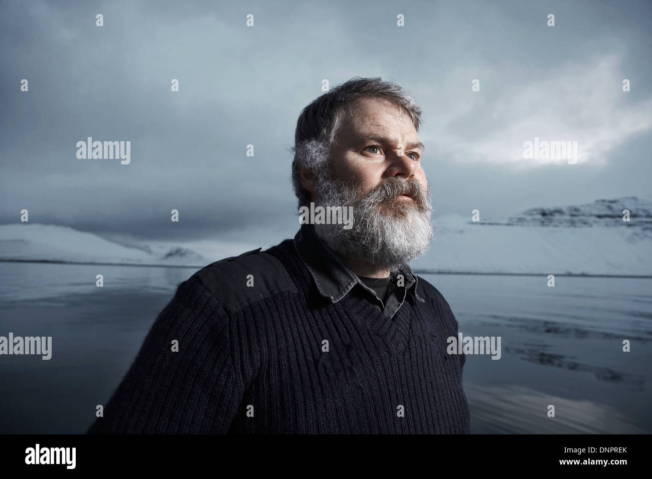 Fisherman With Gray Beard On His Boat In Winter Iceland Stock Photo Alamy