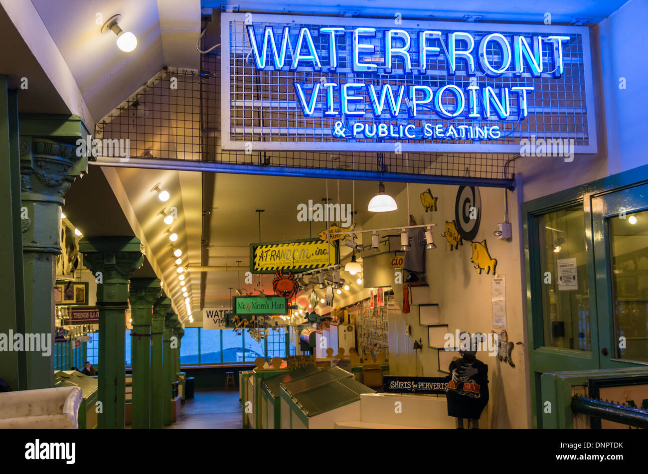 Neon sign and empty market stalls Pike Place Market Seattle, Washington, USA Stock Photo