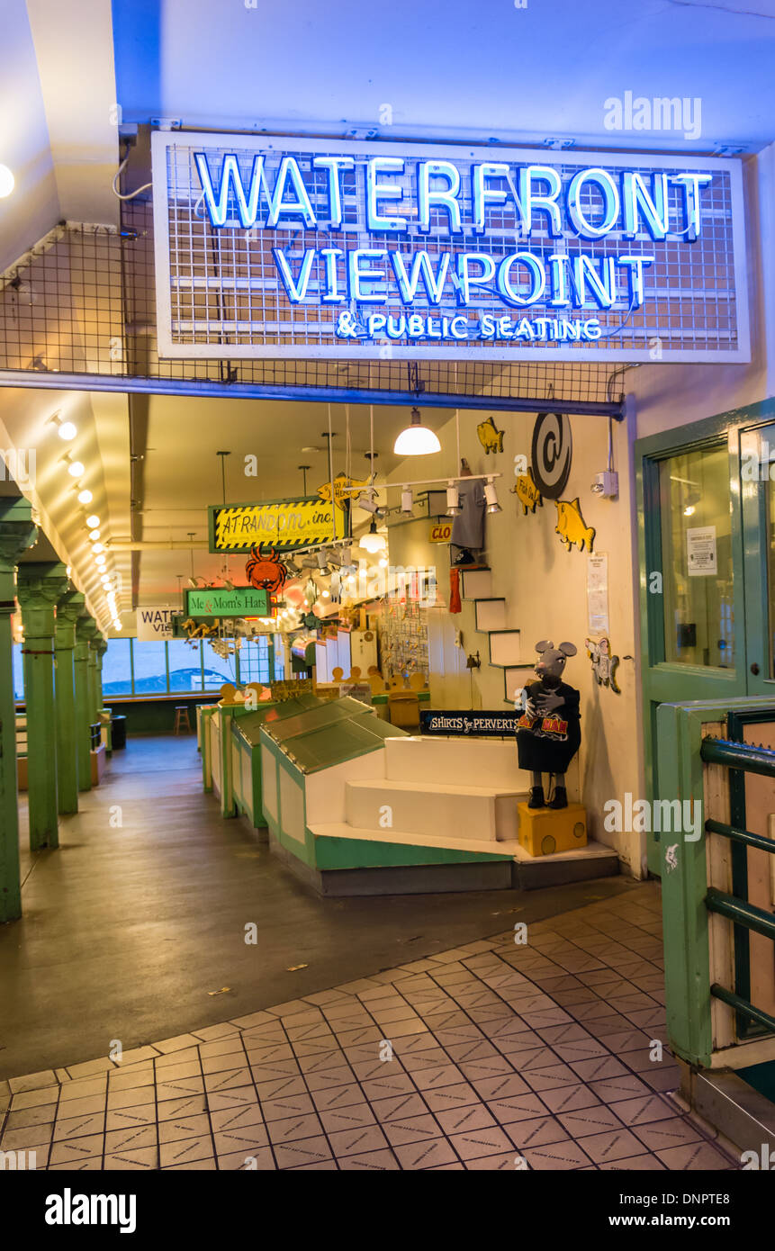 Neon sign and empty market stalls Pike Place Market Seattle, Washington, USA Stock Photo