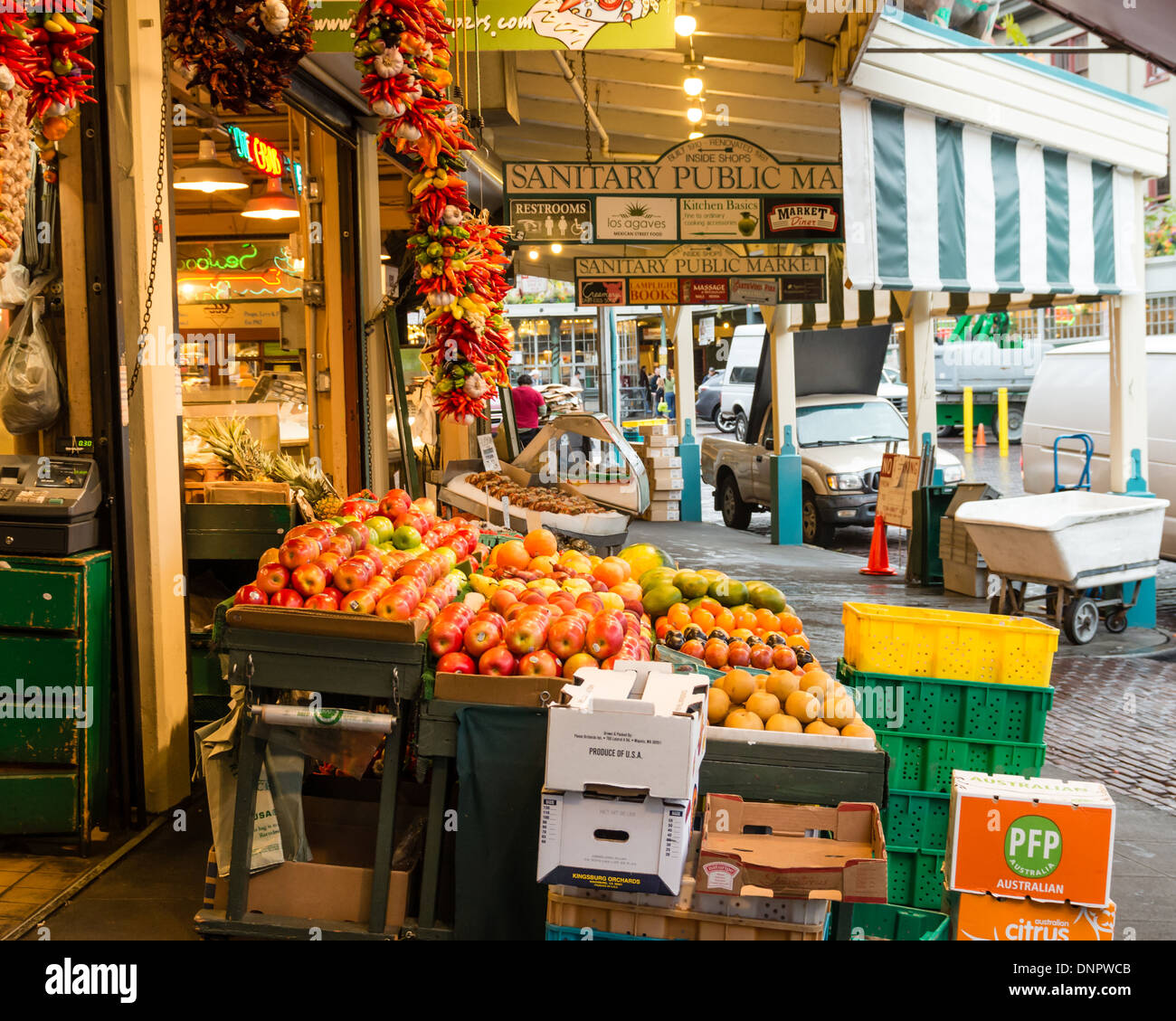 Produce vendor's market stall at the Sanitary Public Market Pike Place Market Seattle, Washington, USA Stock Photo