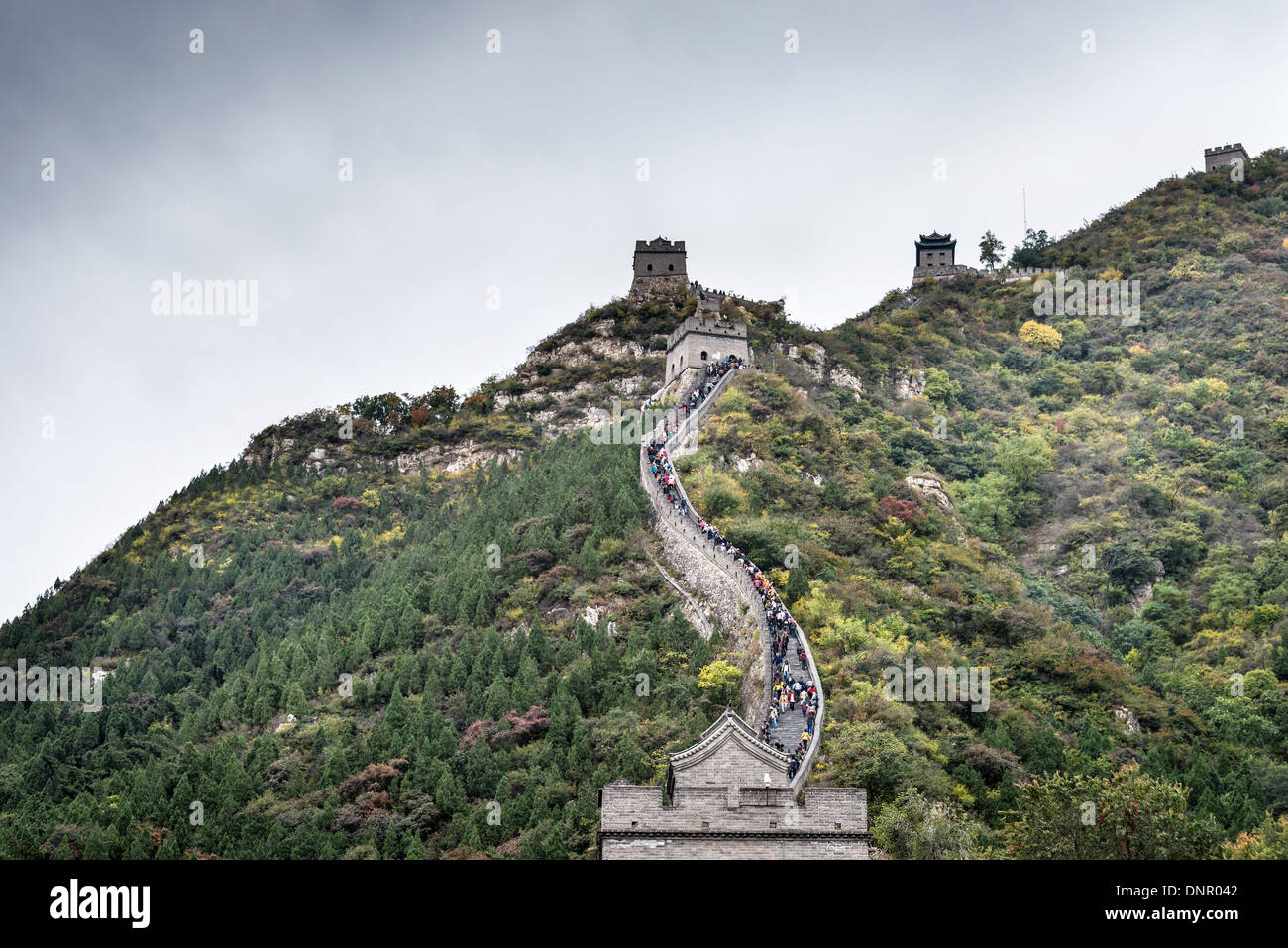 People climb the Great Wall of China on a cloudy day Stock Photo Alamy