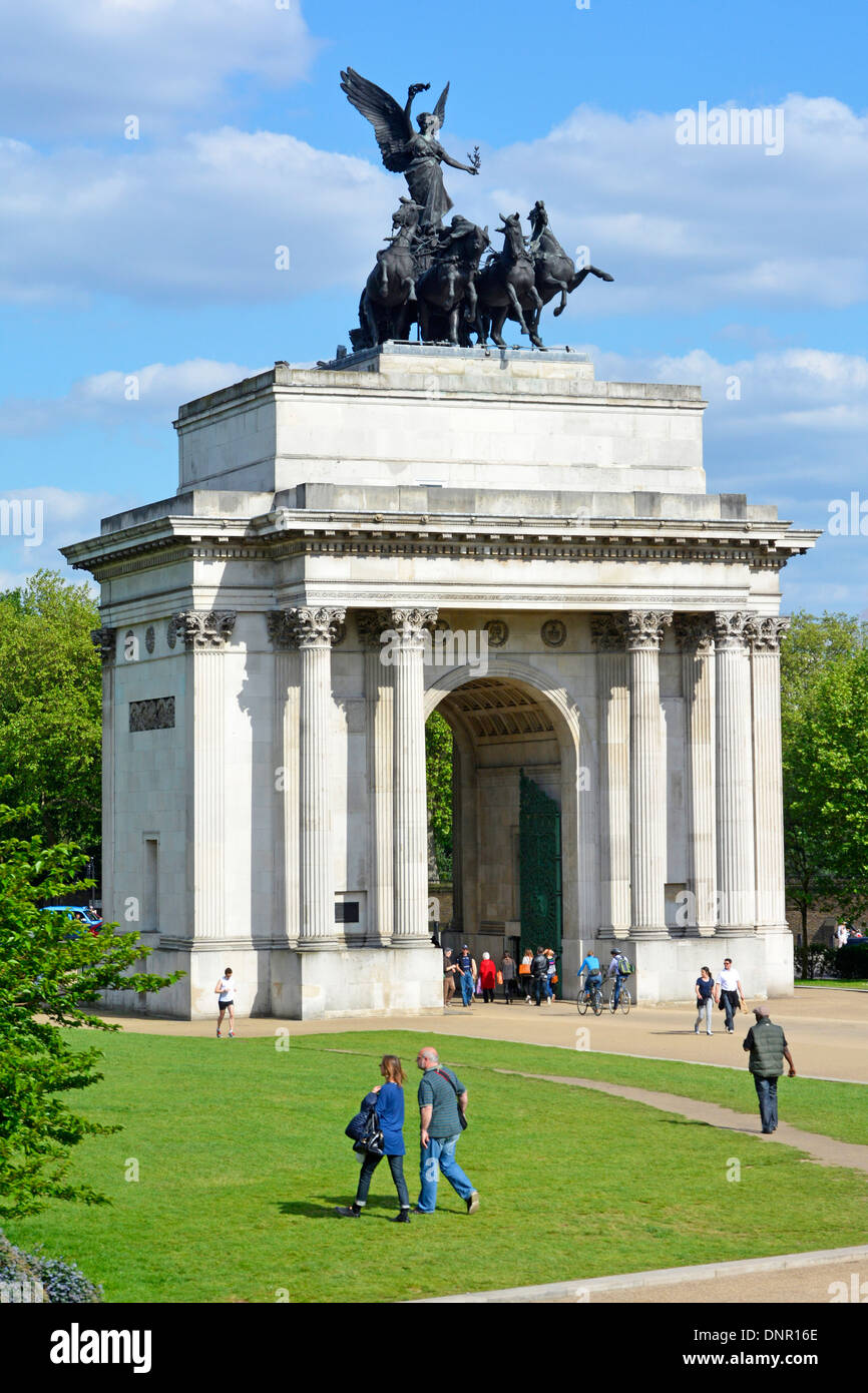 Wellington Arch & bronze Quadriga four horse chariot a historical triumphal arch building located in major road junction at Hyde Park Corner London UK Stock Photo