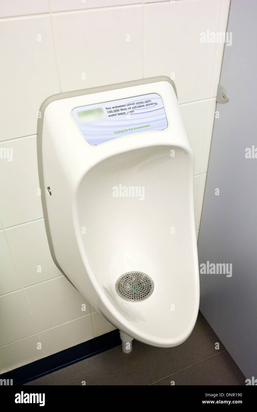 Waterless urinal bowl installed in a leading UK retail company shopping store (company name removed) Stock Photo