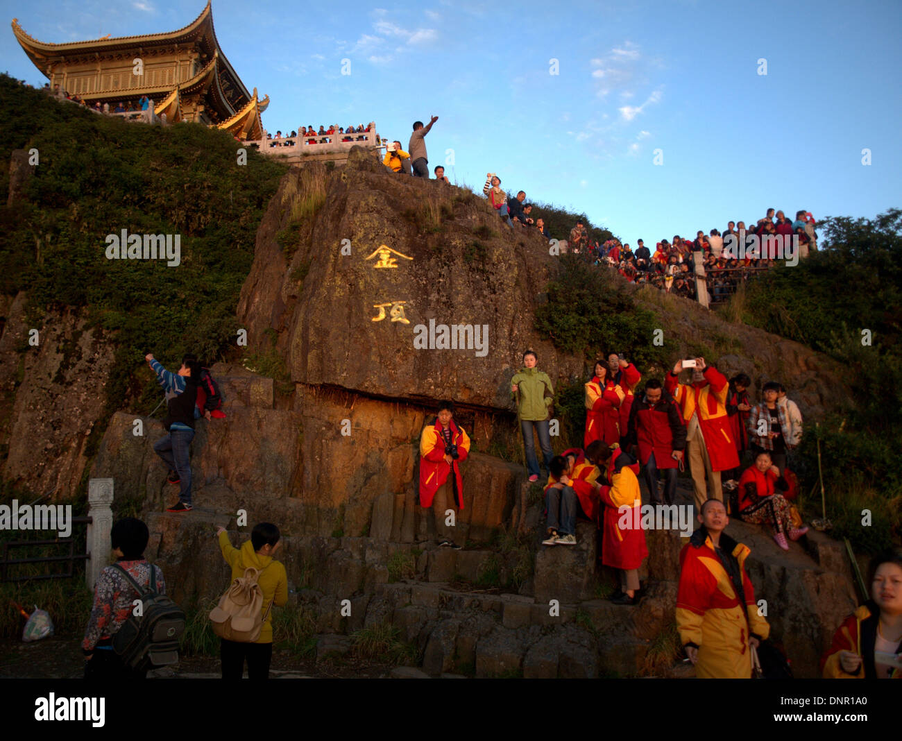 Sunrise dawn temples at the Golden summit of Mount Emei, Emei Shan, near Leshan, Sichuan province, China. Stock Photo