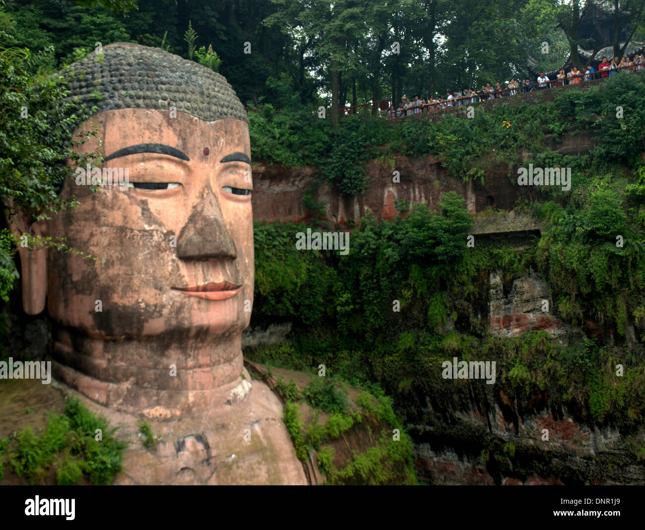 The Leshan Giant Buddha, a 233-foot tall stone statue, built during the Tang Dynasty in Sichuan, China, near Leshan. Stock Photo
